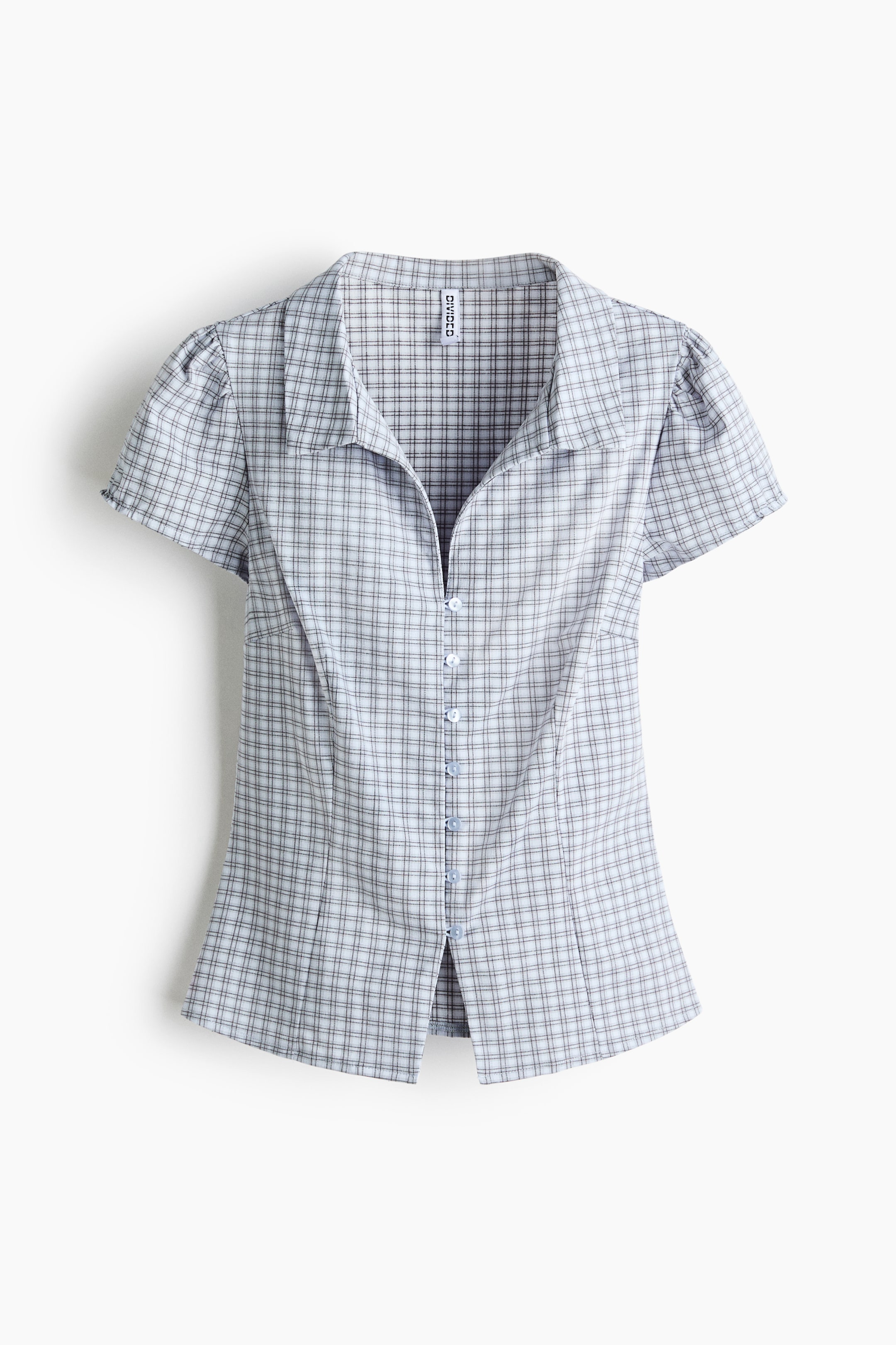 View larger image: The collared button-front top showcases a light blue and white checkered pattern, with short puffed sleeves and an open pointed collar. The front closure features light blue buttons, and the top offers a tailored silhouette with a small front hem slit.