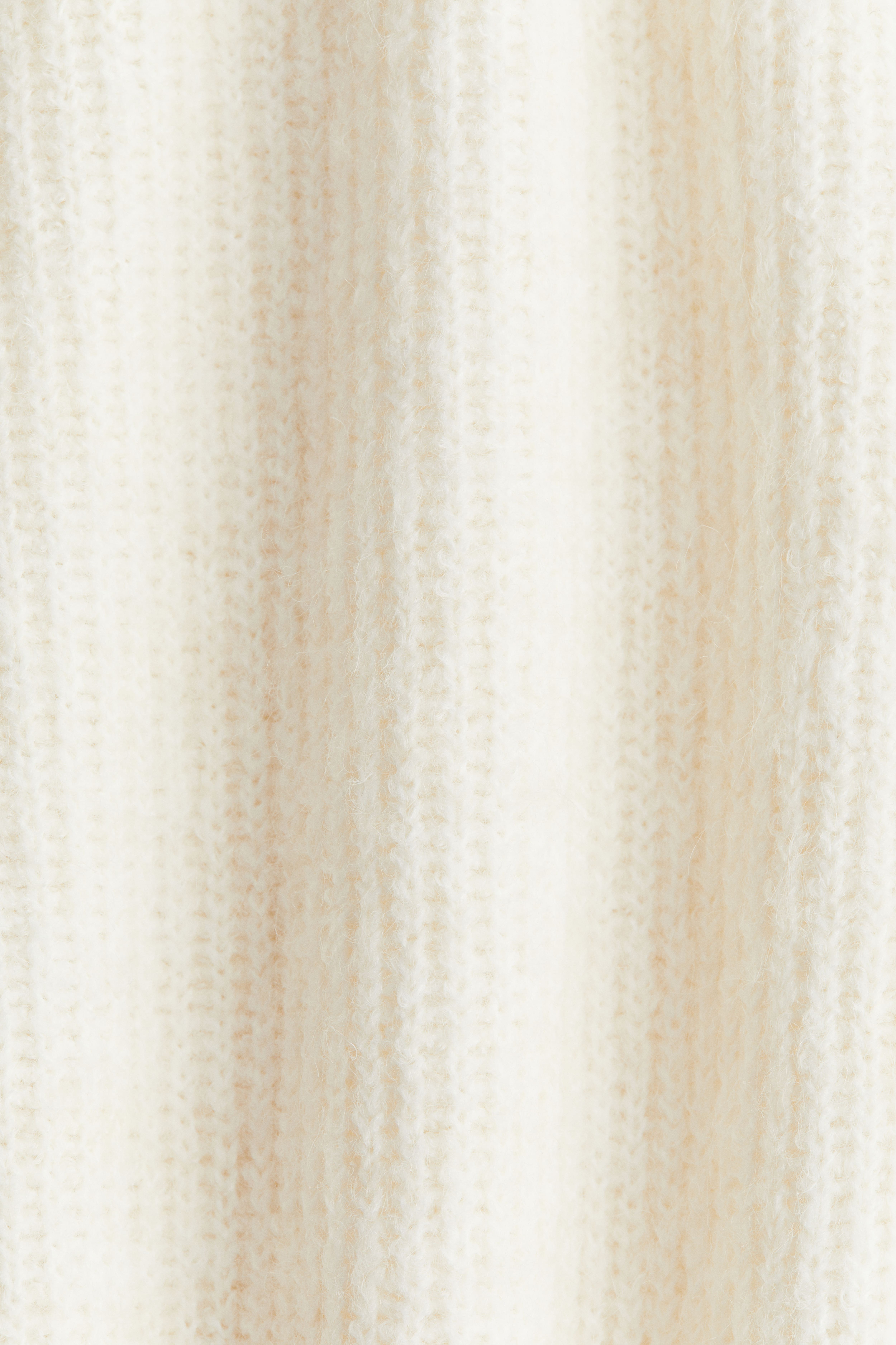 Rib-Knit Peplum Top
