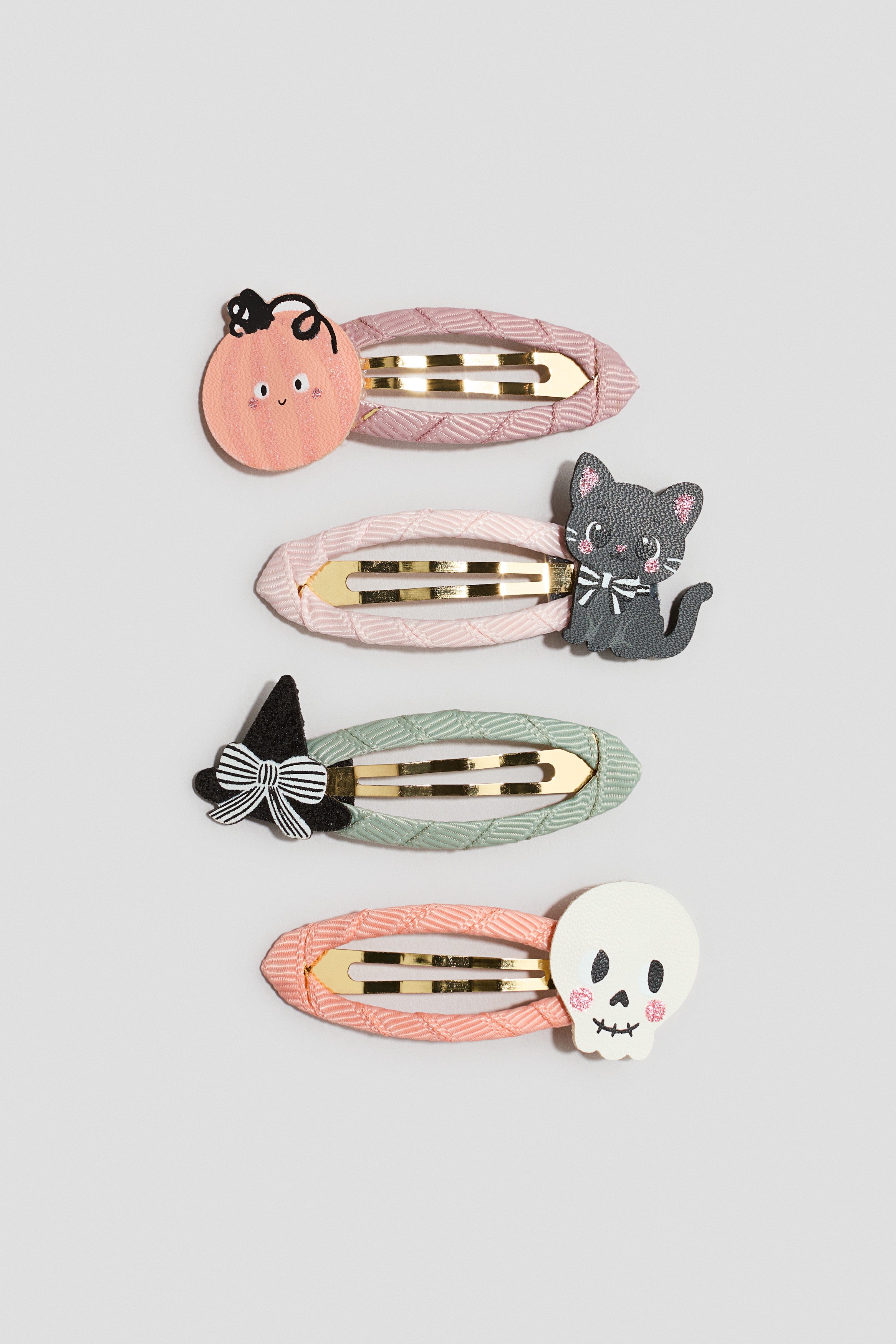 Lot de 4 barrettes avec appliquésModèle
