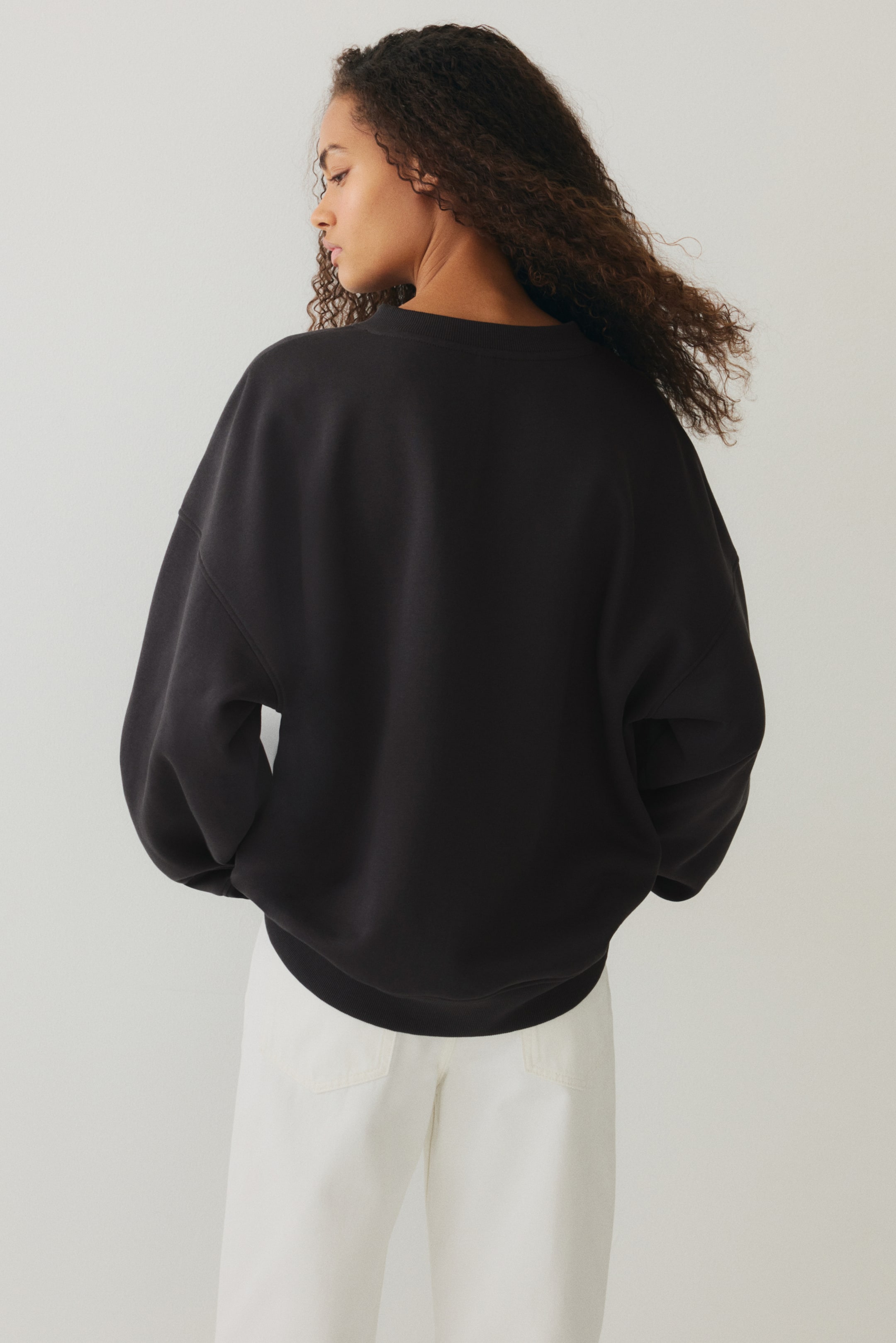 View larger image: Oversized V-neck sweatshirt - Dark grey/Long beach - Ladies | H&M IE 3