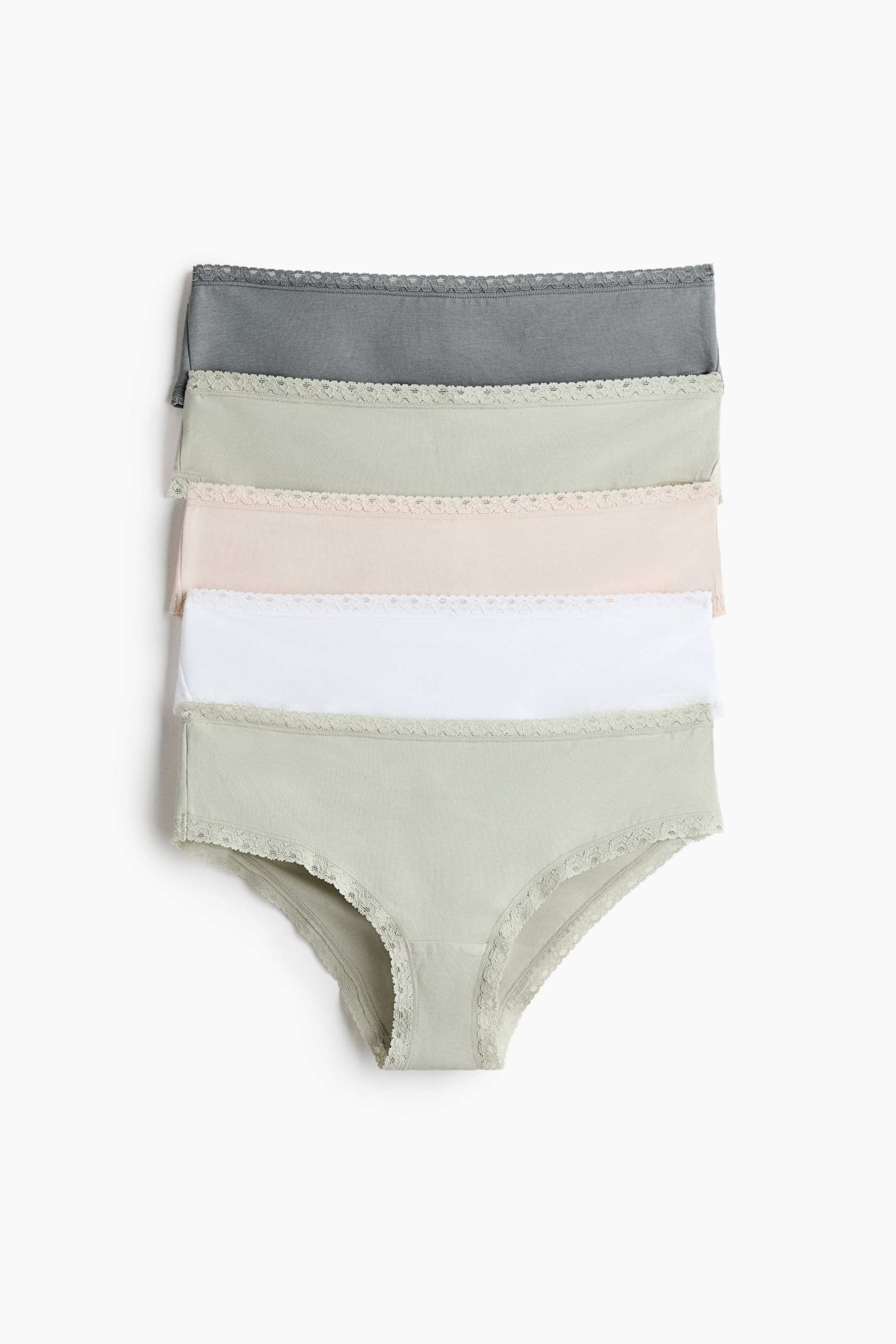 View larger image: Five cotton jersey briefs are layered, with the bottom brief facing forward and showcasing a mid-waist cut. Each brief features narrow lace trims along the waistline and leg openings. A lined gusset is visible on the bottom brief, and the briefs appear in shades of grey, light green, beige, white, and a darker sage green.