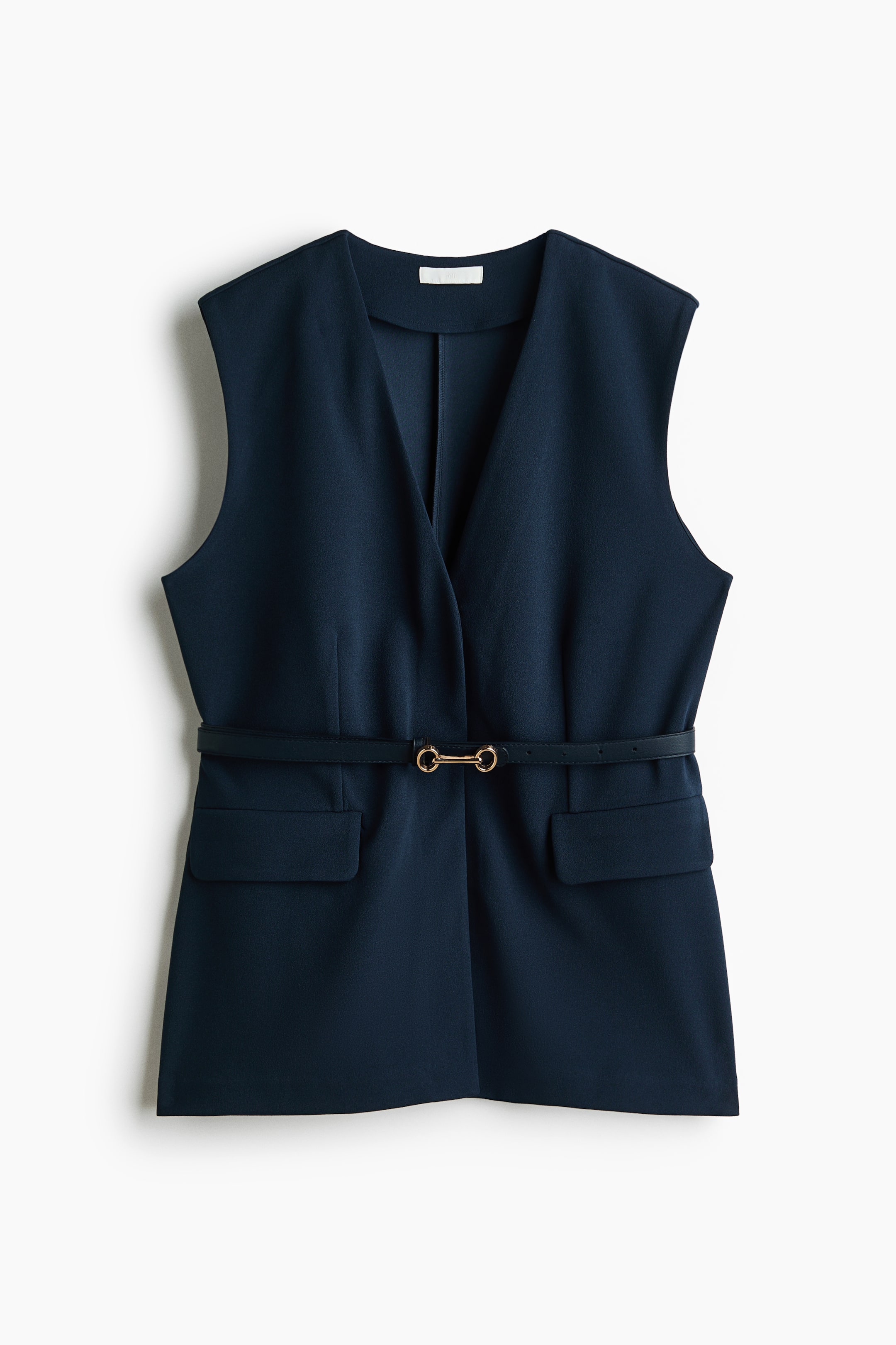 View larger image: A dark navy waistcoat is shown from the front, featuring a V-neckline, a detachable waist belt in dark coated fabric with a gold-coloured metal buckle that cinches the waist, and two decorative pocket flaps at the front.
