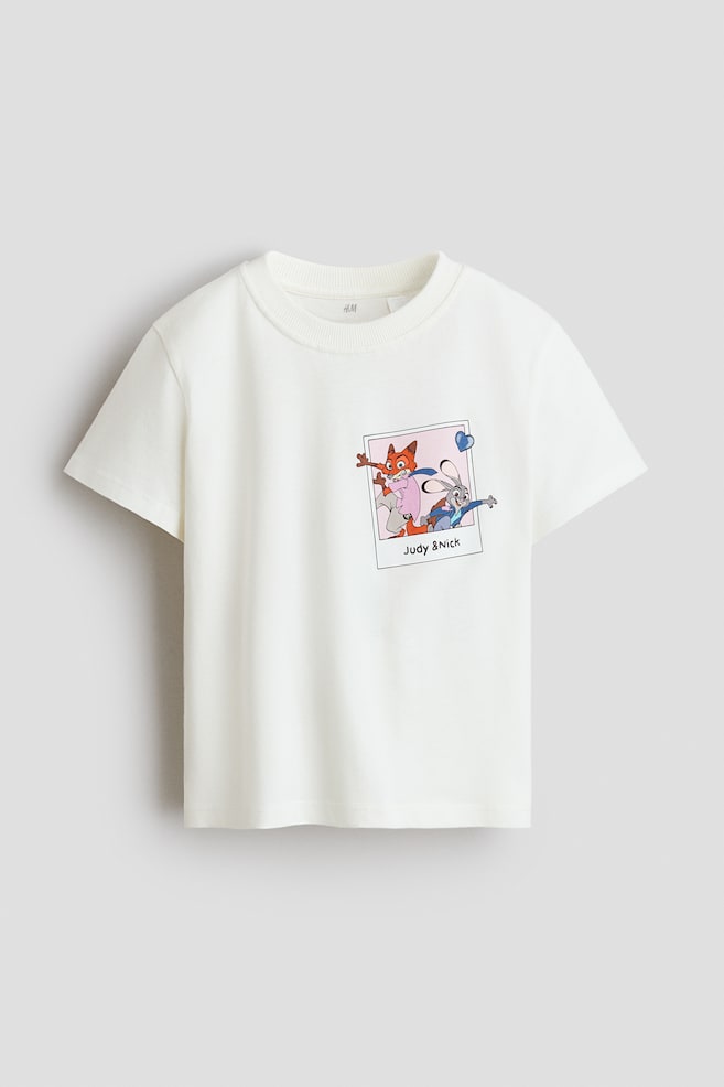 Cotton T-Shirt with Printed Motif - White/Zootopia/White/KPop Demon Hunters/Dark gray/KPop Demon Hunters/White/KPop Demon Hunters/Pink/Moana/Dark gray melange/Nirvana/Light pink/Lilo & Stitch/Light turquoise/Aristocats/Pink/Hello Kitty/Pink/Lilo & Stitch - 1