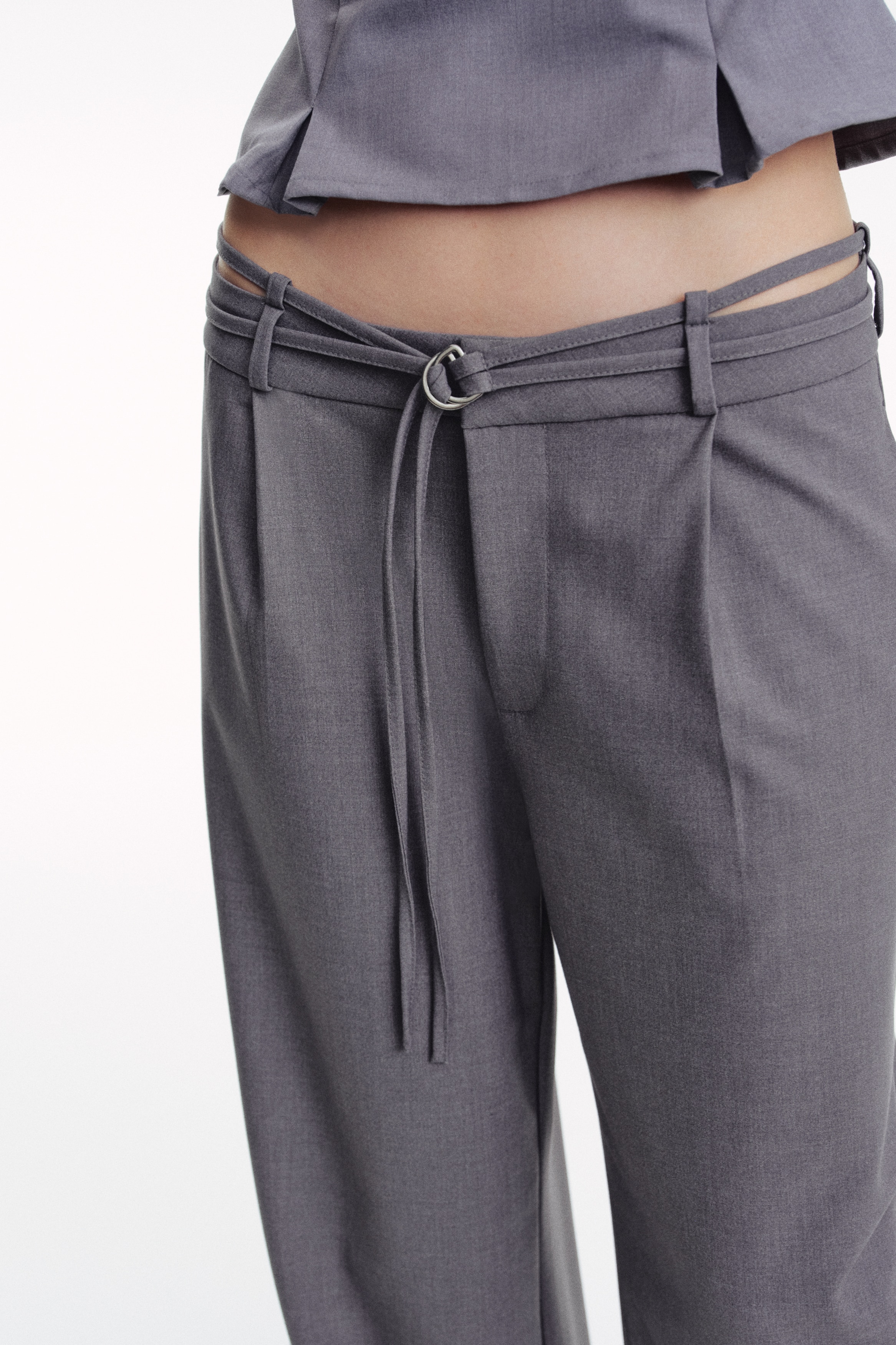 Belted tailored trousers