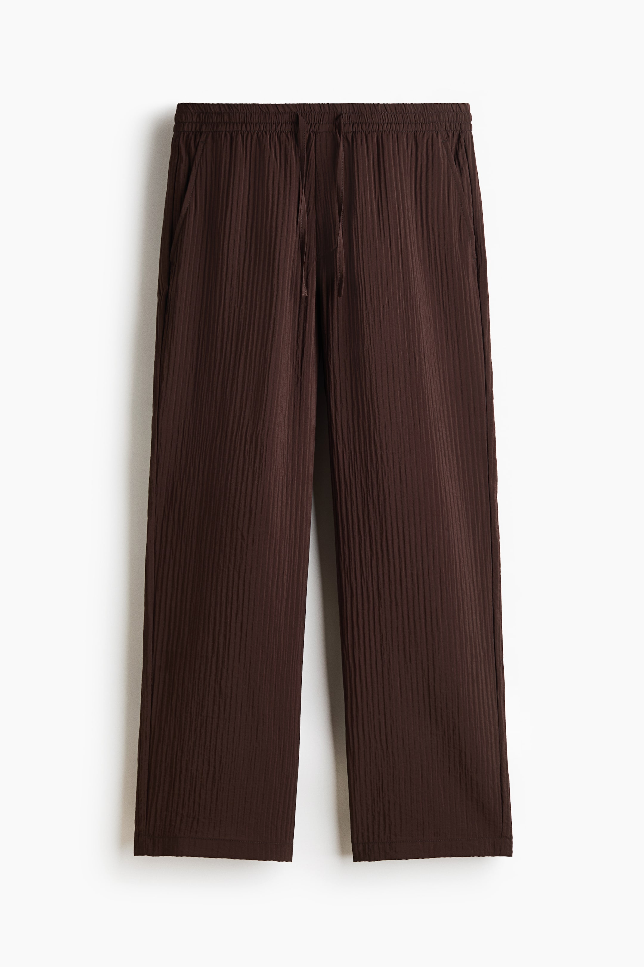 Ampliar la imagen: Pantalón texturizado Relaxed Fit - Dark brown - Men | H&M MX 1