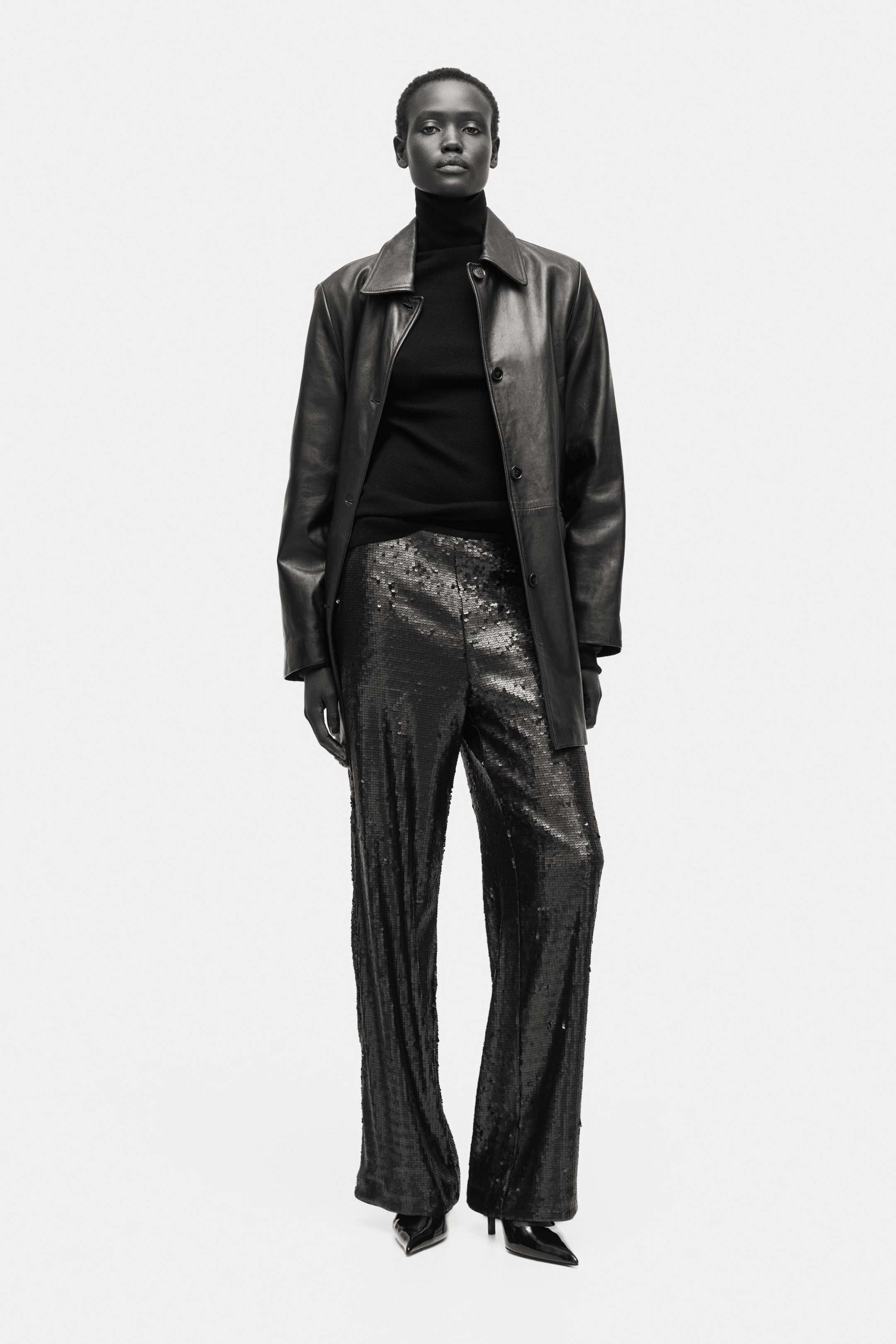 Näytä suurempi kuva: Paljettikoristeiset housut - Musta - NAISET | H&M FI 1