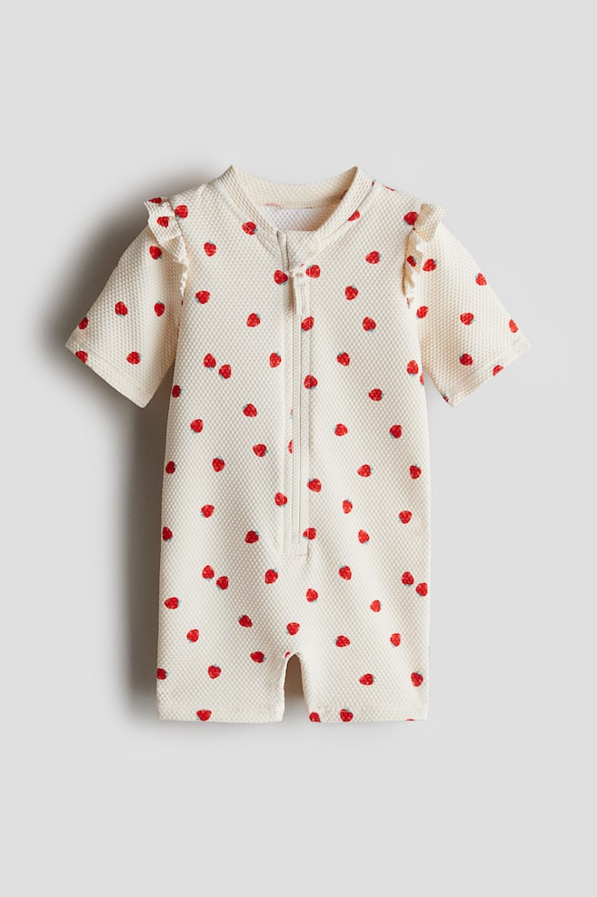 Maillot de bain UPF 50 - Crème/fraises/Blanc/coquillages/Rose clair/fleuri/Bleu clair/cerises/Beige clair/cœurs/Rose clair/fleuri - 1