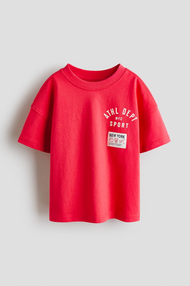 T-shirt oversize en coton imprimé - Rouge/NYC Sport/Crème/NYC/Ivoire/Sports League/Jaune pâle/sardines/Vert/Artist on Duty/Turquoise clair/Good Life - 1