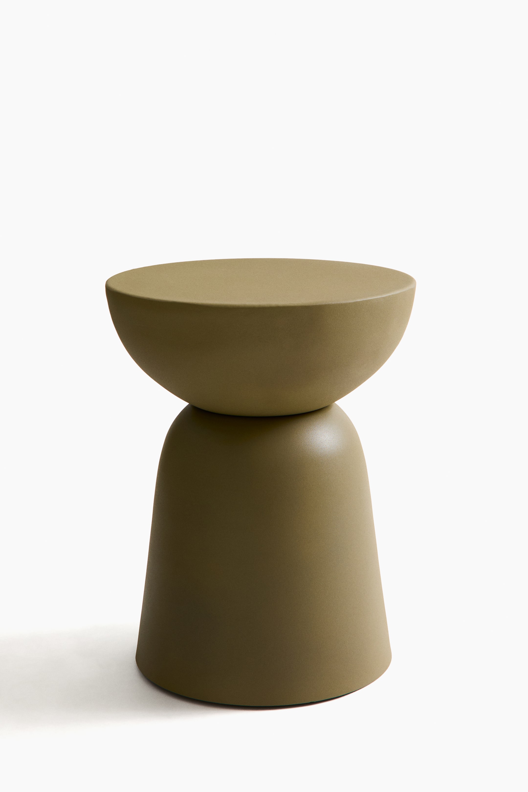 View larger image: An olive-green side table is shown from the front, with a shallow, inverted dome forming the top, which rests on a rounded, tapering base. It features a slightly textured, matt surface.