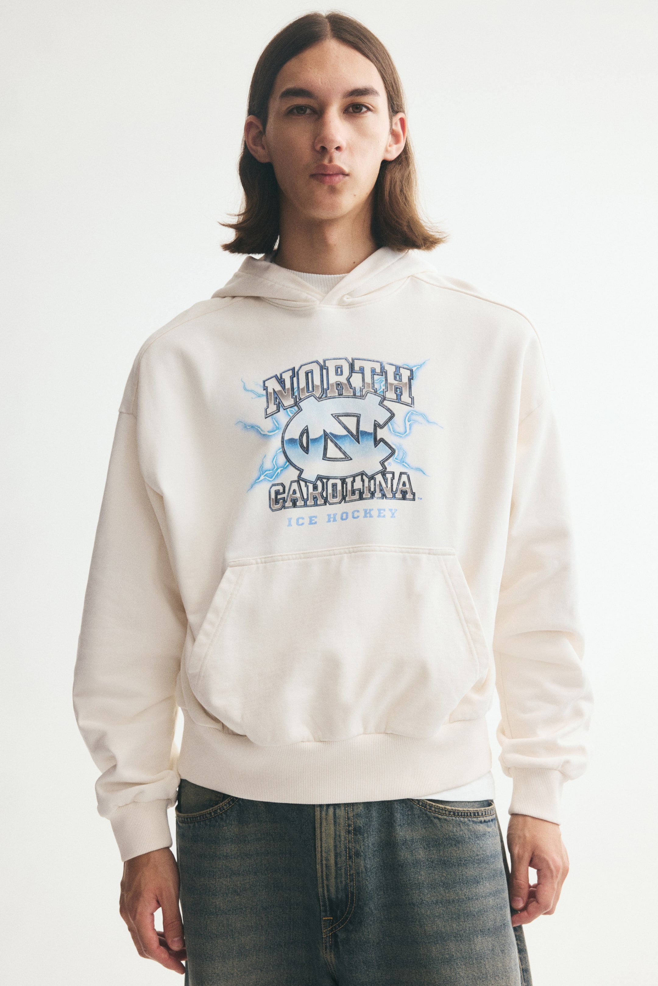 View larger image: Oversized Fit Printed cotton hoodie - Cream/UNC - Men | H&M 1