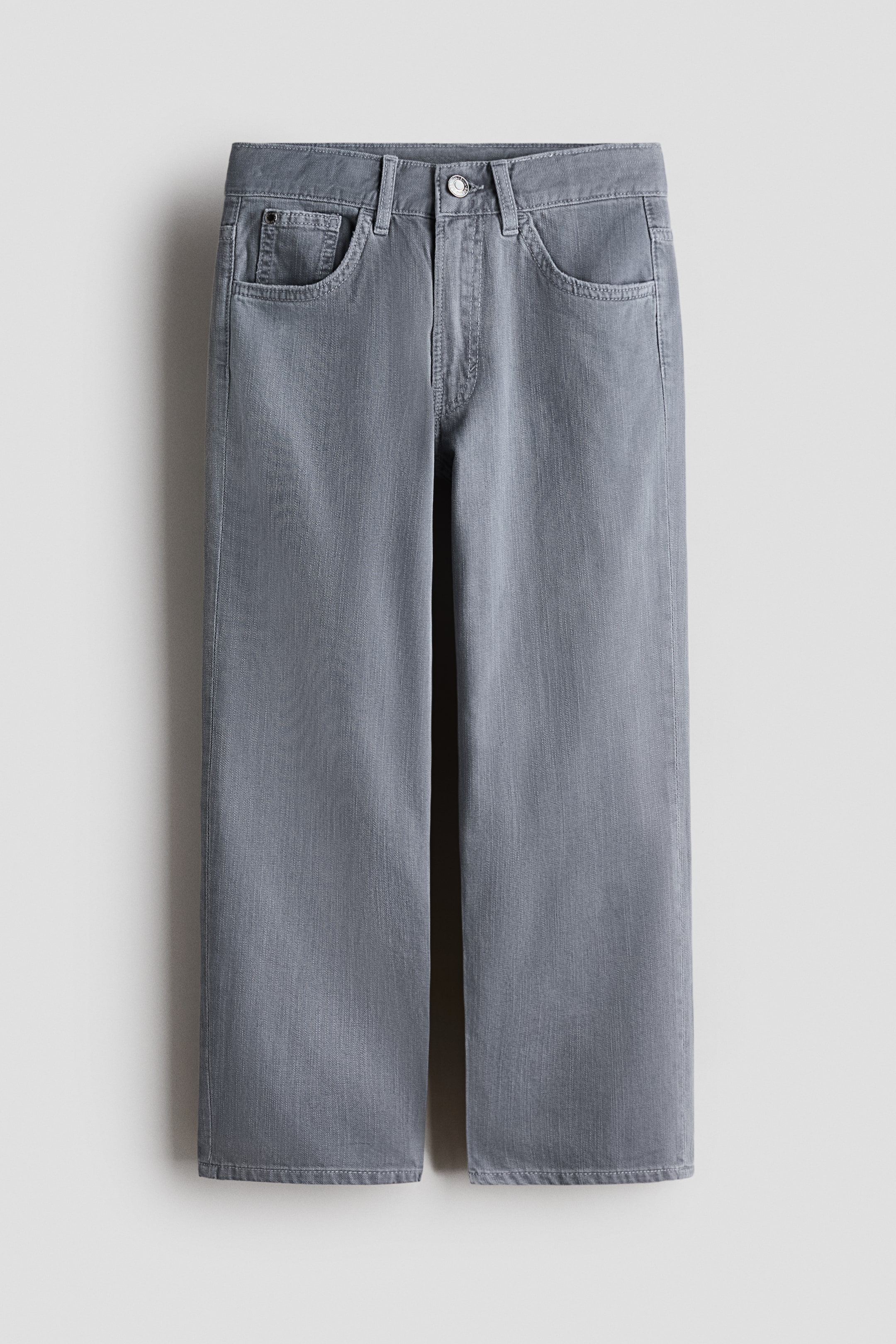 View larger image: Grey denim jeans feature a relaxed, straight-leg design, with the front showing a classic five-pocket construction, belt loops and a single metal button fastening.