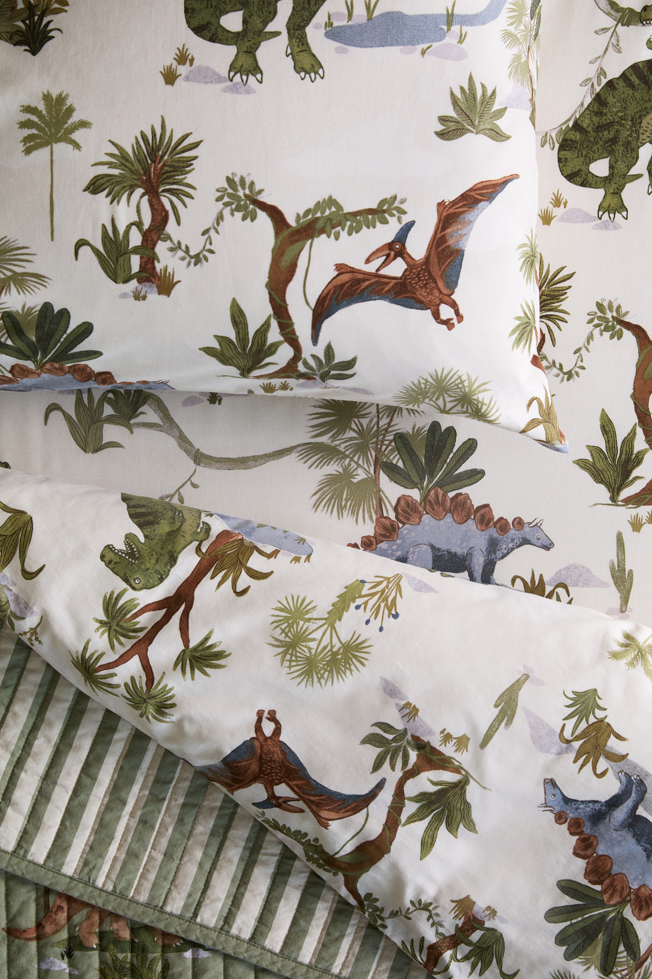 Visualizza immagine più grande: Lenzuolo con angoli in cotone fantasia - Beige chiaro/dinosauri - HOME | H&M IT 1