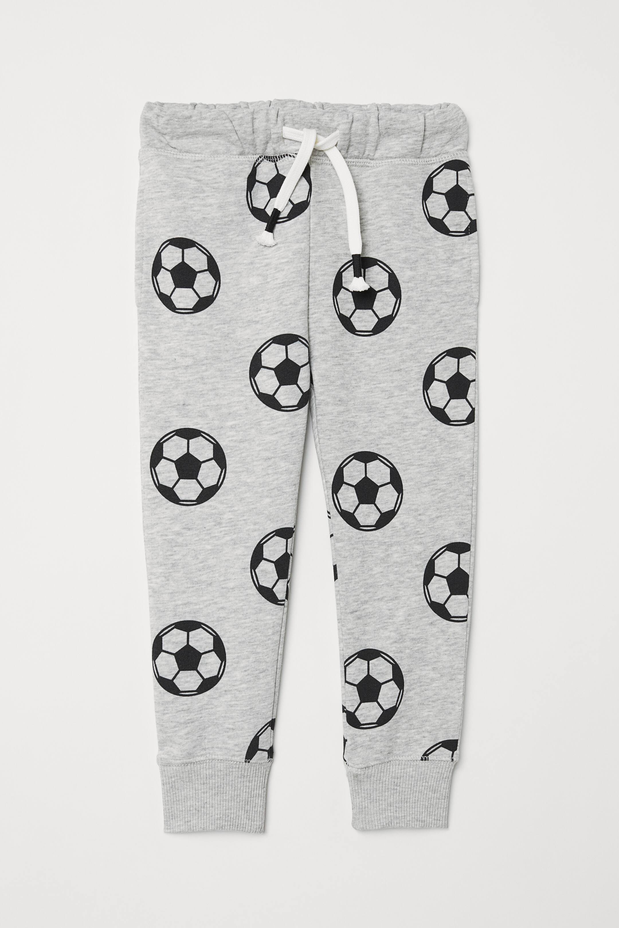 View larger image: Sweatpants - Light grey marl/Footballs - Kids | H&M 1