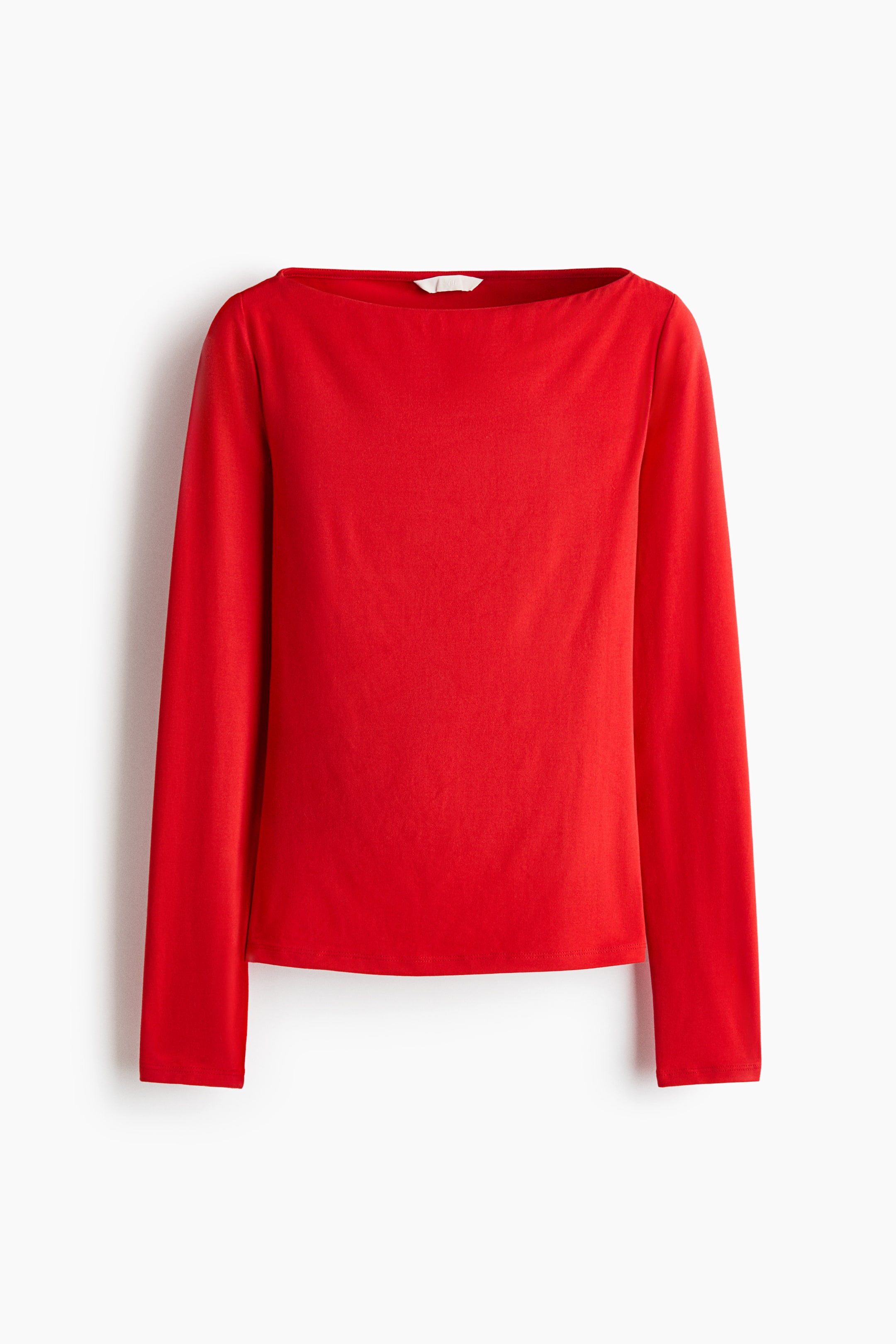 View larger image: A red fitted top in stretch jersey is facing the front, featuring a wide boat neck, long sleeves, and a straight hem.