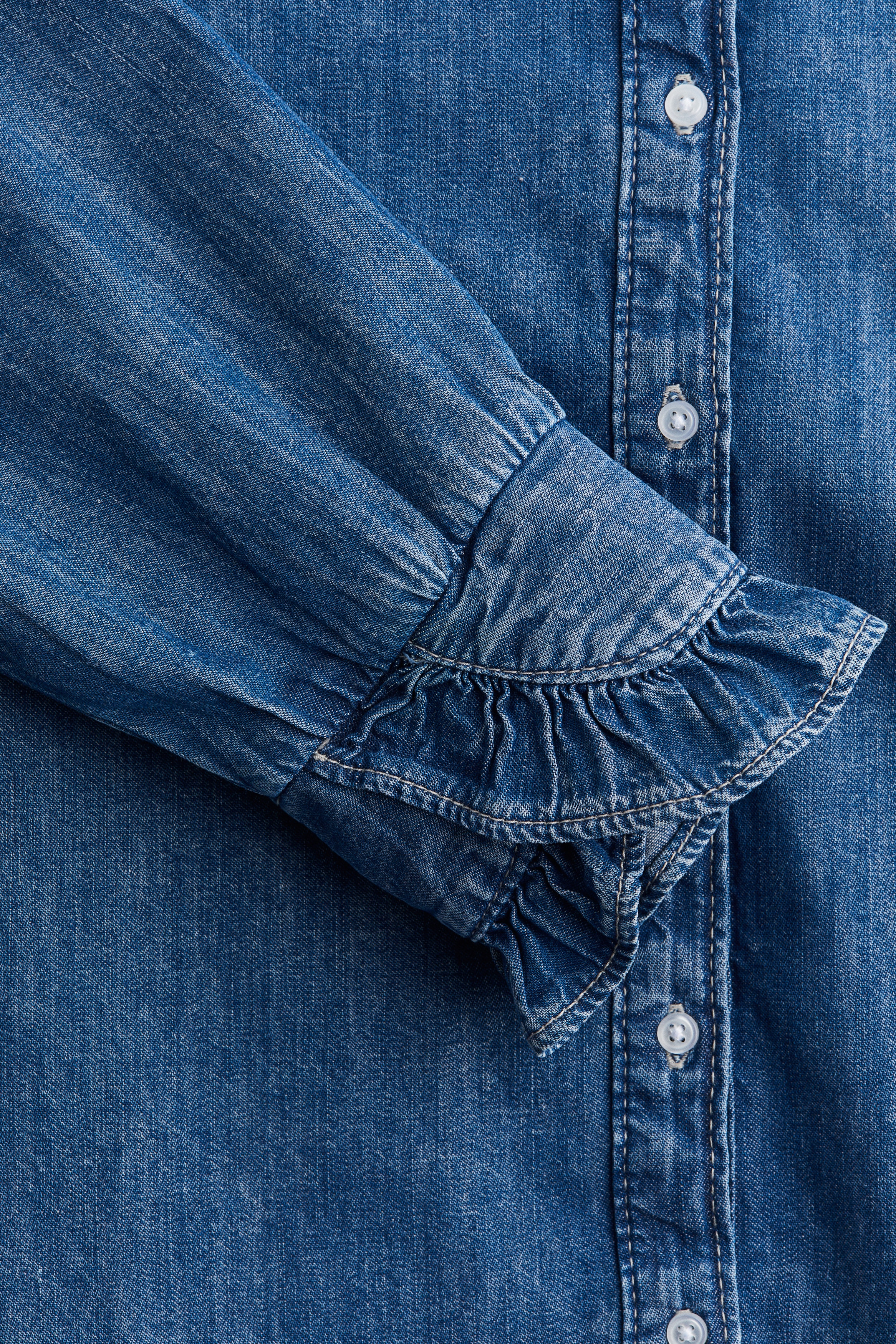 Frill-trimmed denim blouse