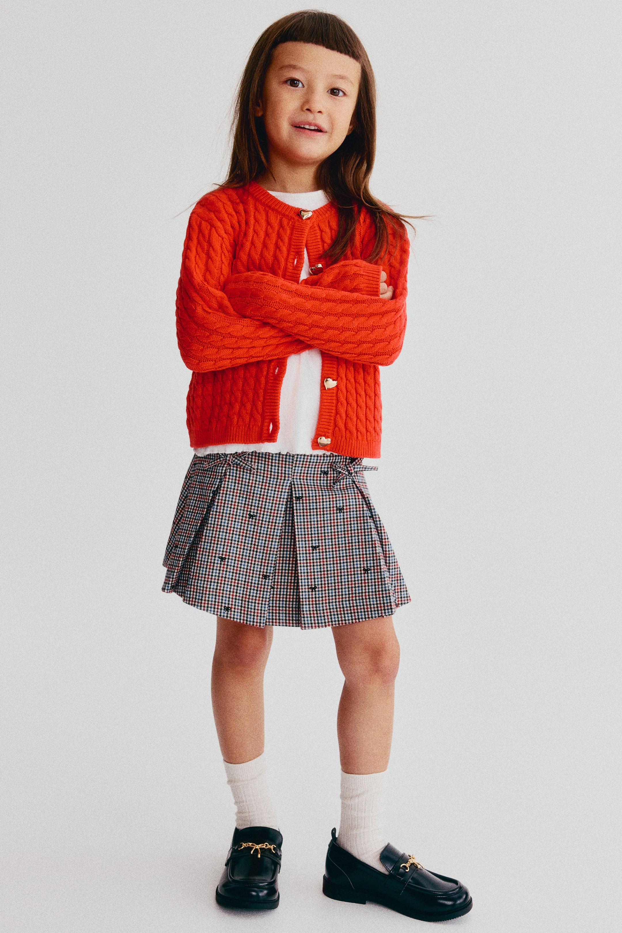 View larger image: Bow-detail pleated skirt - Light beige/Checked - Kids | H&M 1