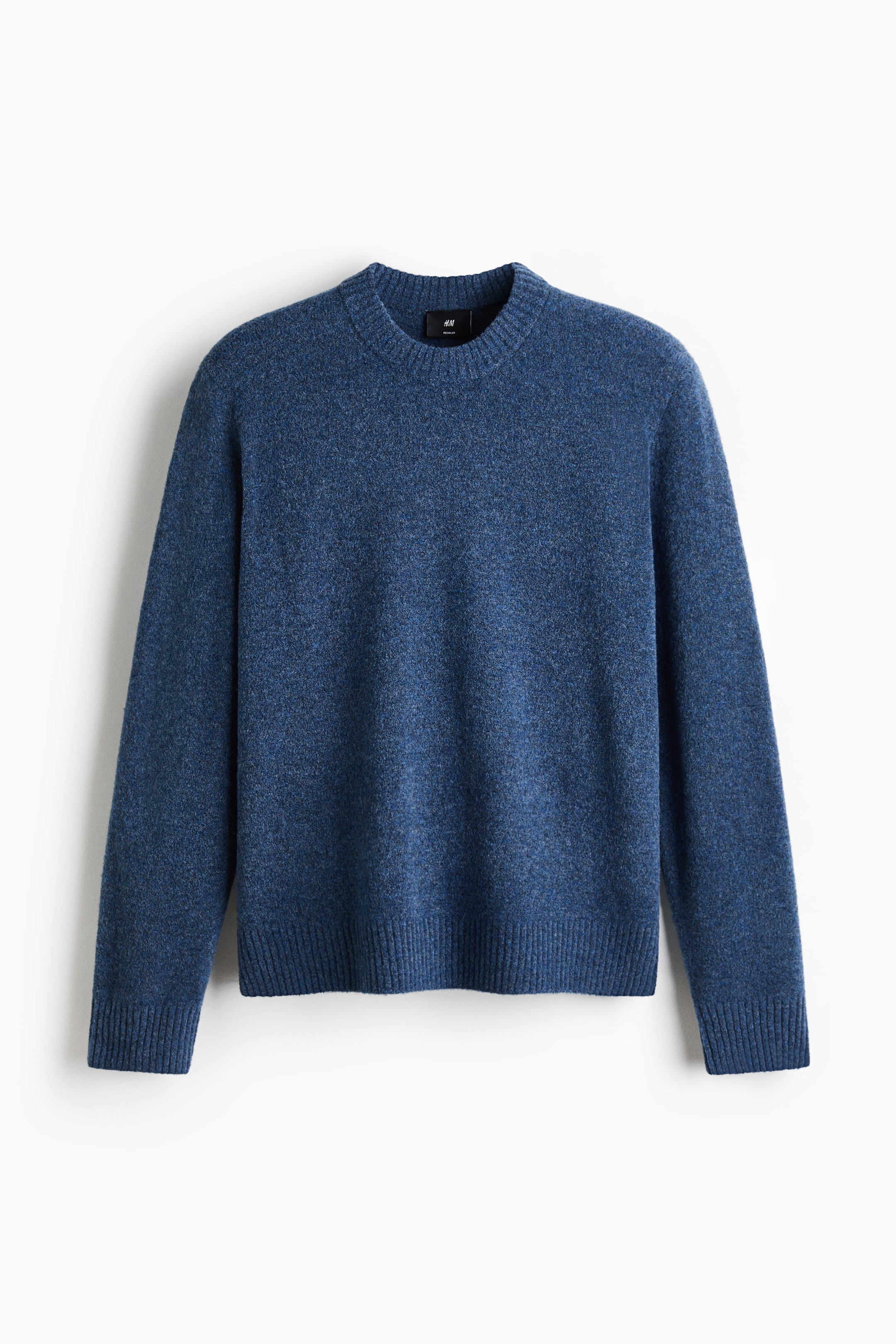 View larger image: A blue heathered sweater is facing forward, showcasing a crew neck along with ribbed cuffs and hem.