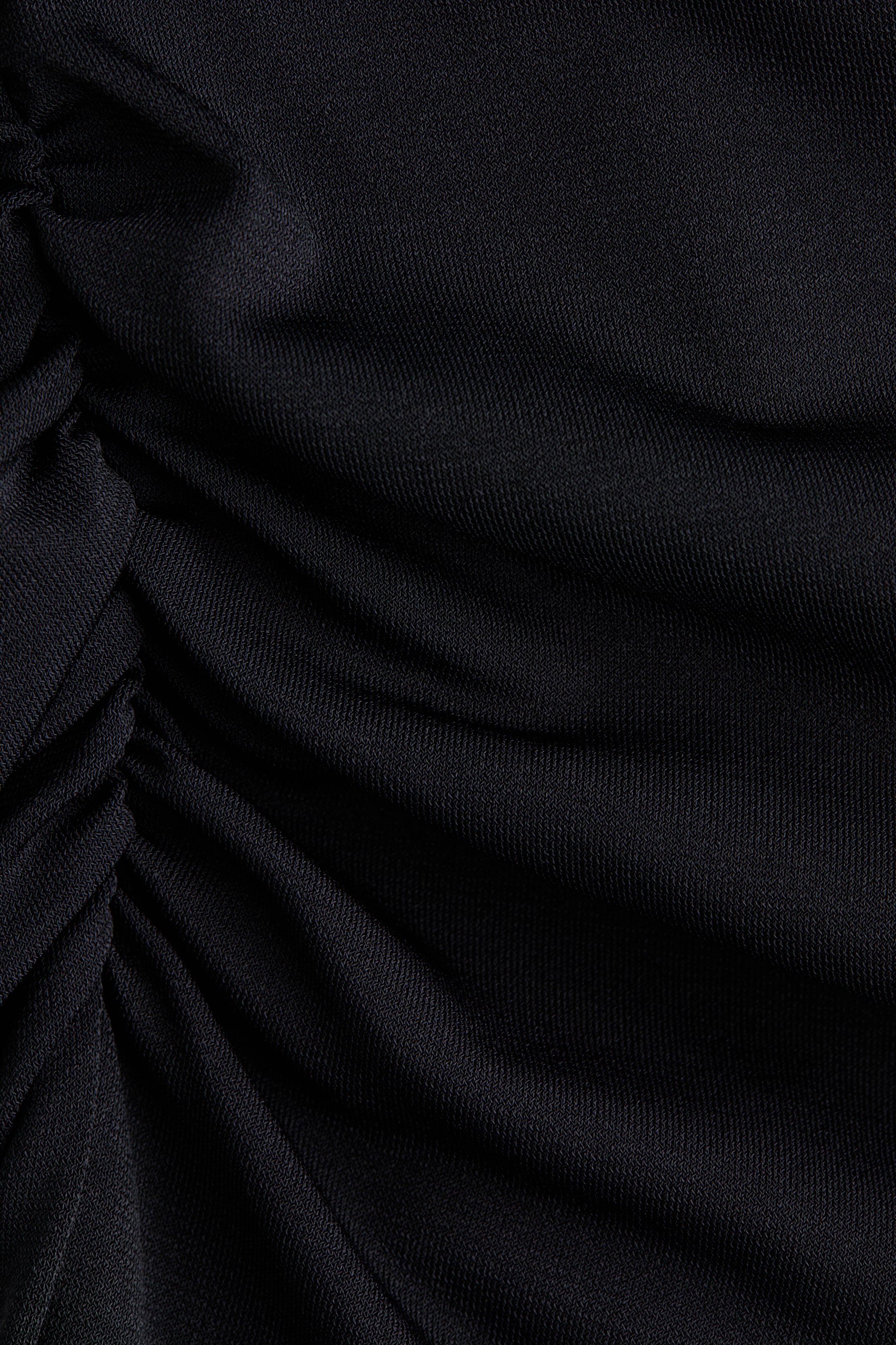 Haut asymétrique à effet drapé