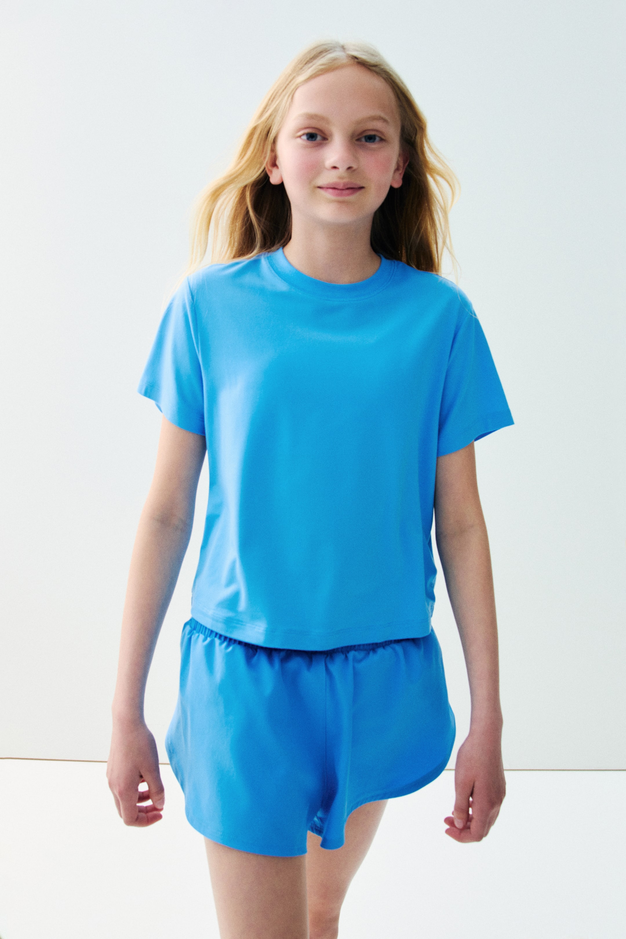 View larger image: The Loose Fit Sports T-shirt with SoftMove showcases a vibrant blue hue and a relaxed fit. It features a crew neck, short sleeves, and a straight hem, presented from the front.