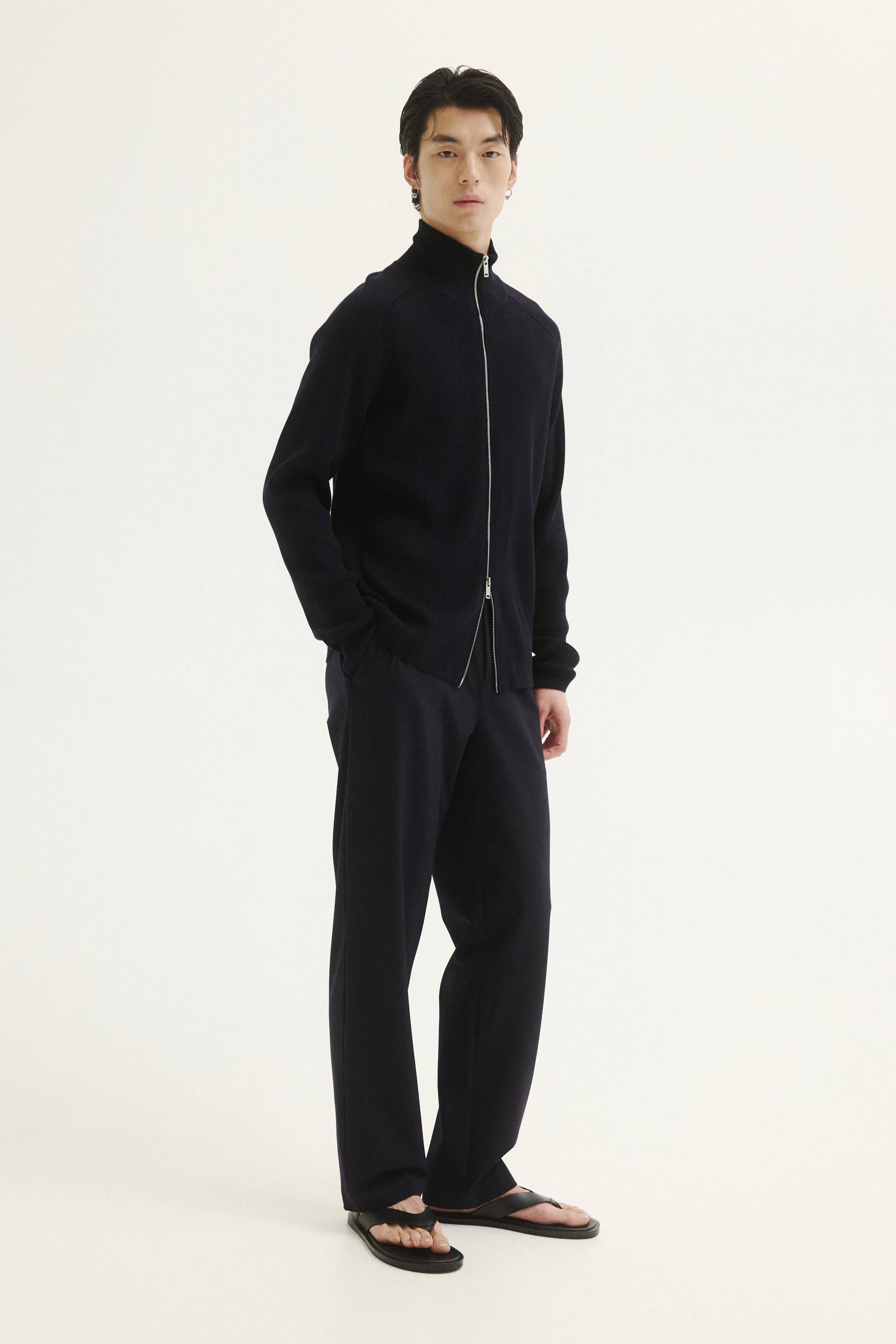 View larger image: Four-way Stretch Regular Fit Pull-on trousers - Navy blue - Men | H&M IE 1