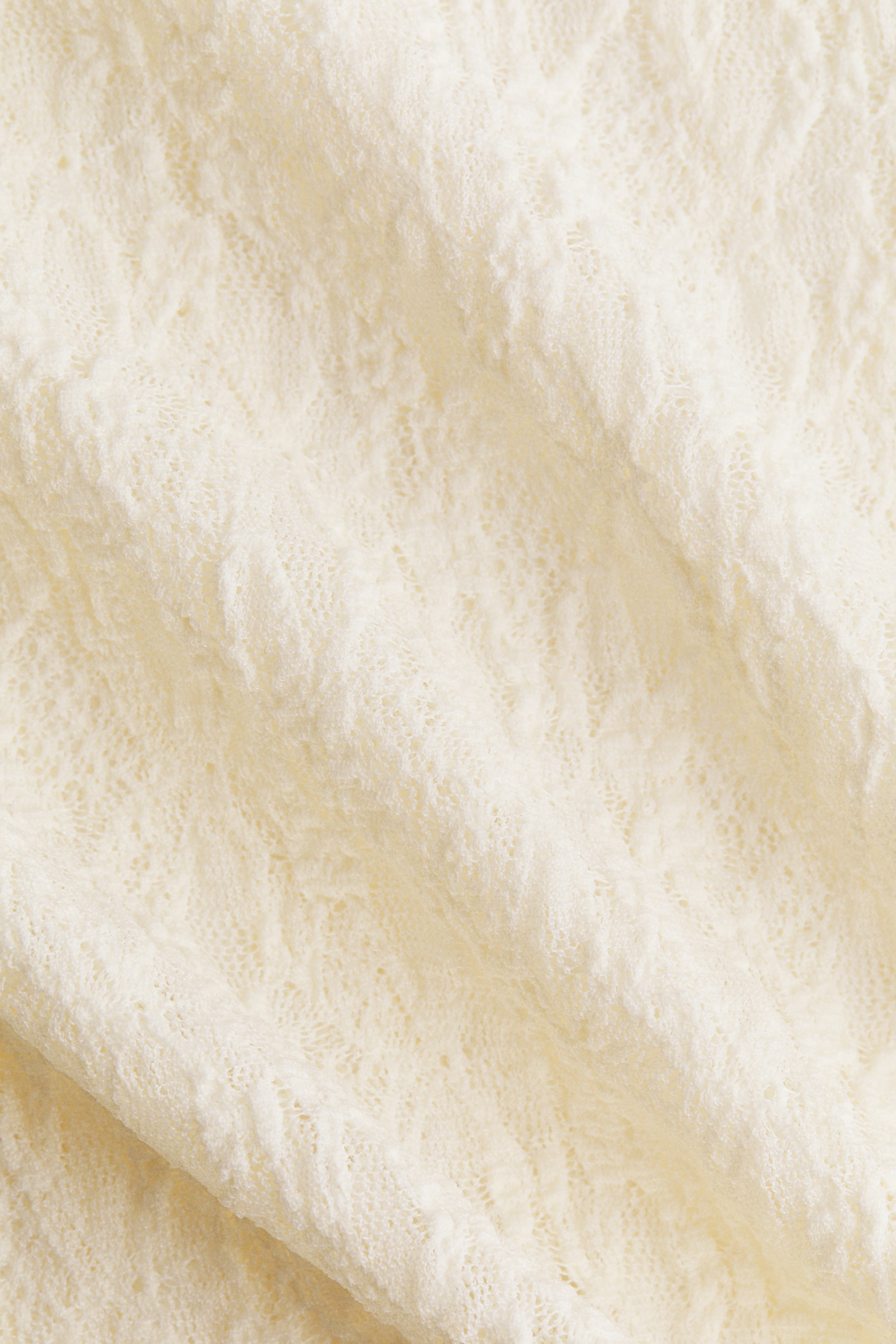 Maillot string en jersey à l’aspect dentelle