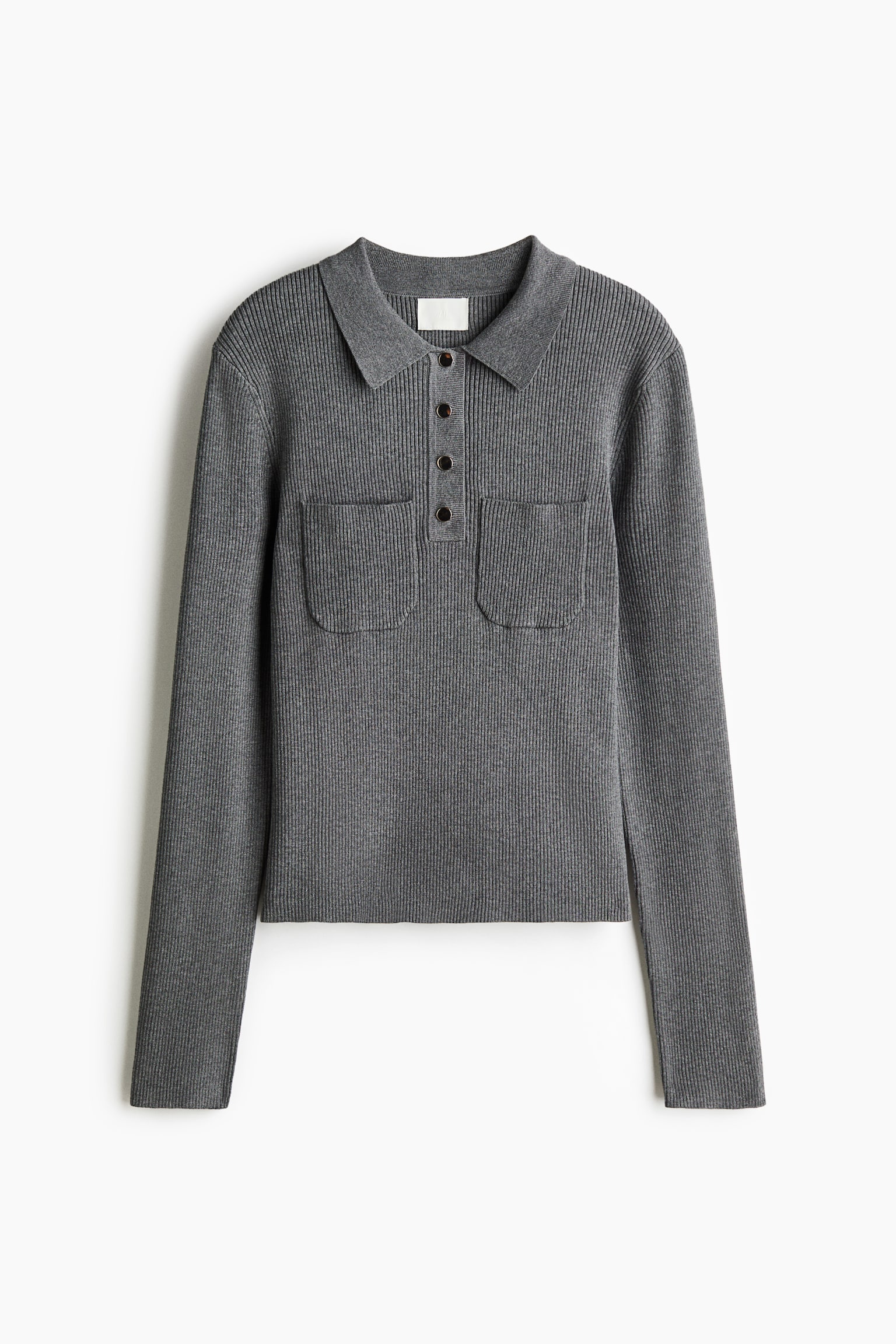 A grey ribbed-knit long-sleeve polo shirt is shown from the front, featuring a pointed collar, a partial button placket with four dark buttons, and two symmetrical chest patch pockets.