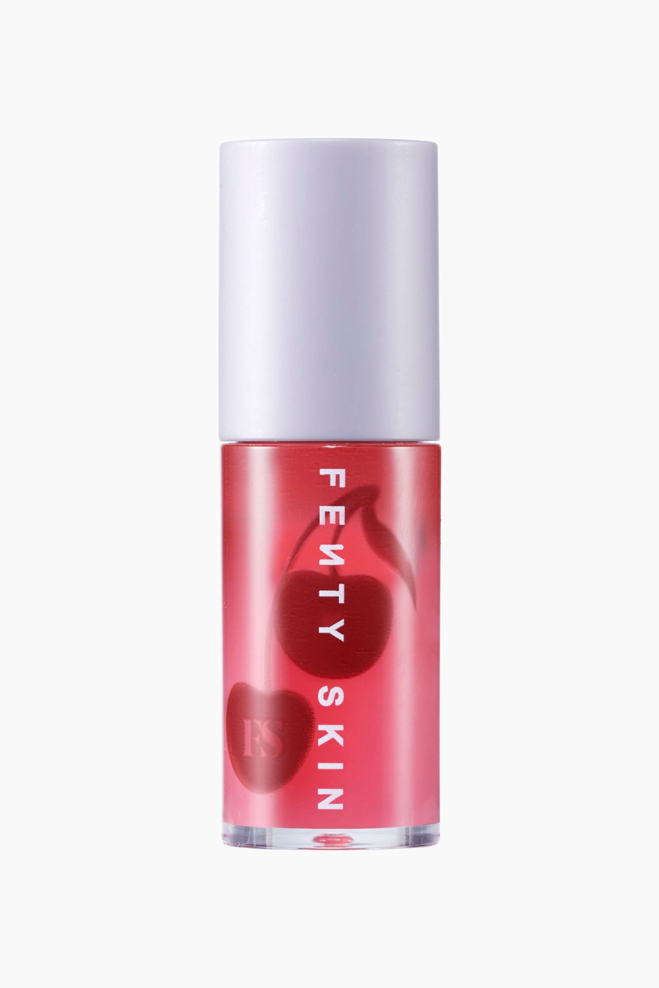 Visa större bild: Treatz Hydrating + Strengthening Lip Oil står upprätt och visar en klar cylindrisk tub fylld med en starkt rosaröd vätska och med ett slätt, ljuslavendelfärgat lock. Den framåtvända behållaren visar vertikal vit "FENTY SKIN"-branding lagd över en grafisk bild av två mörka körsbär som syns genom den transparenta kroppen.