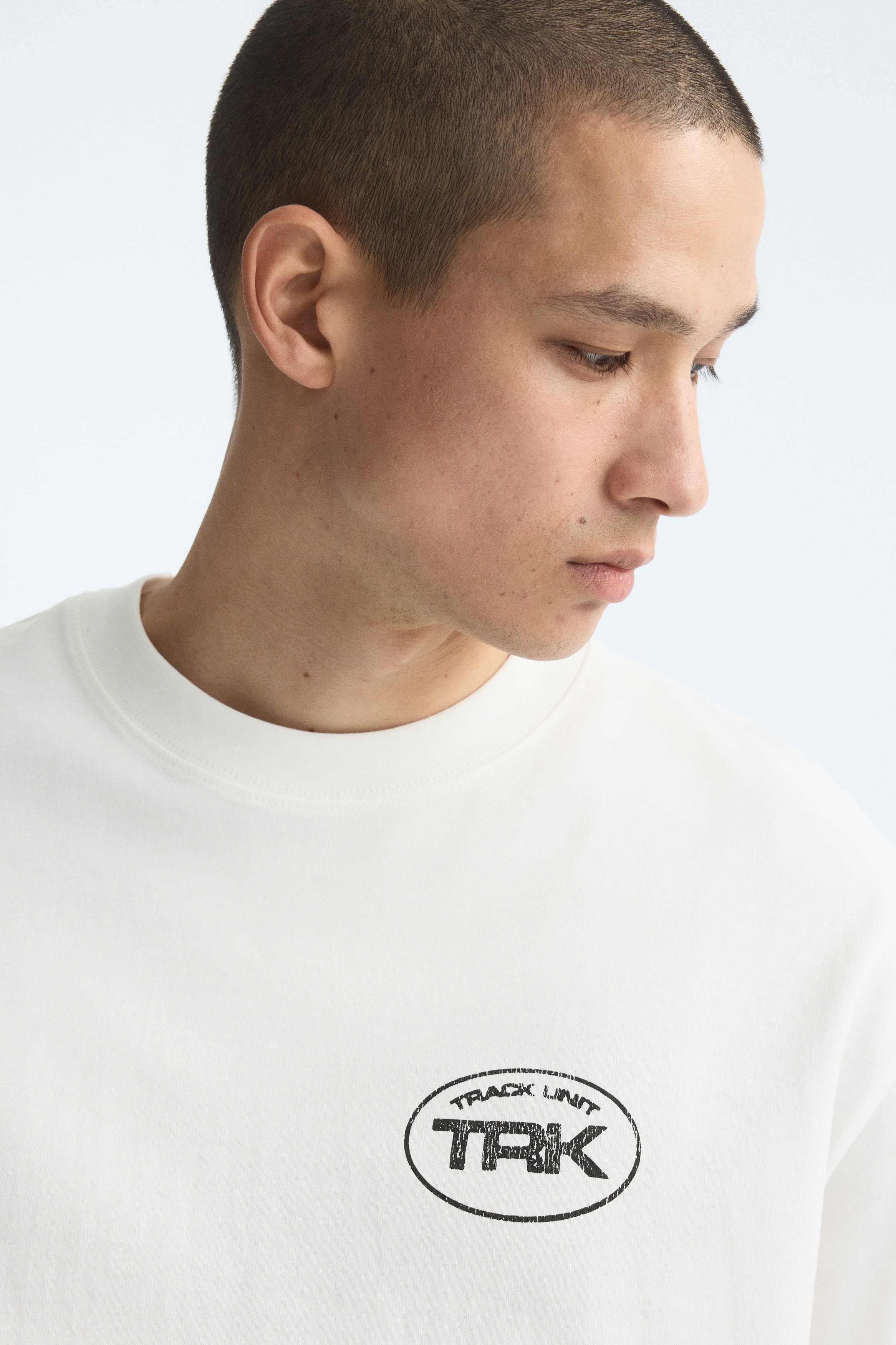 Men's White/Track Unit TRK Relaxed-Fit Printed T-Shirt | H&M US