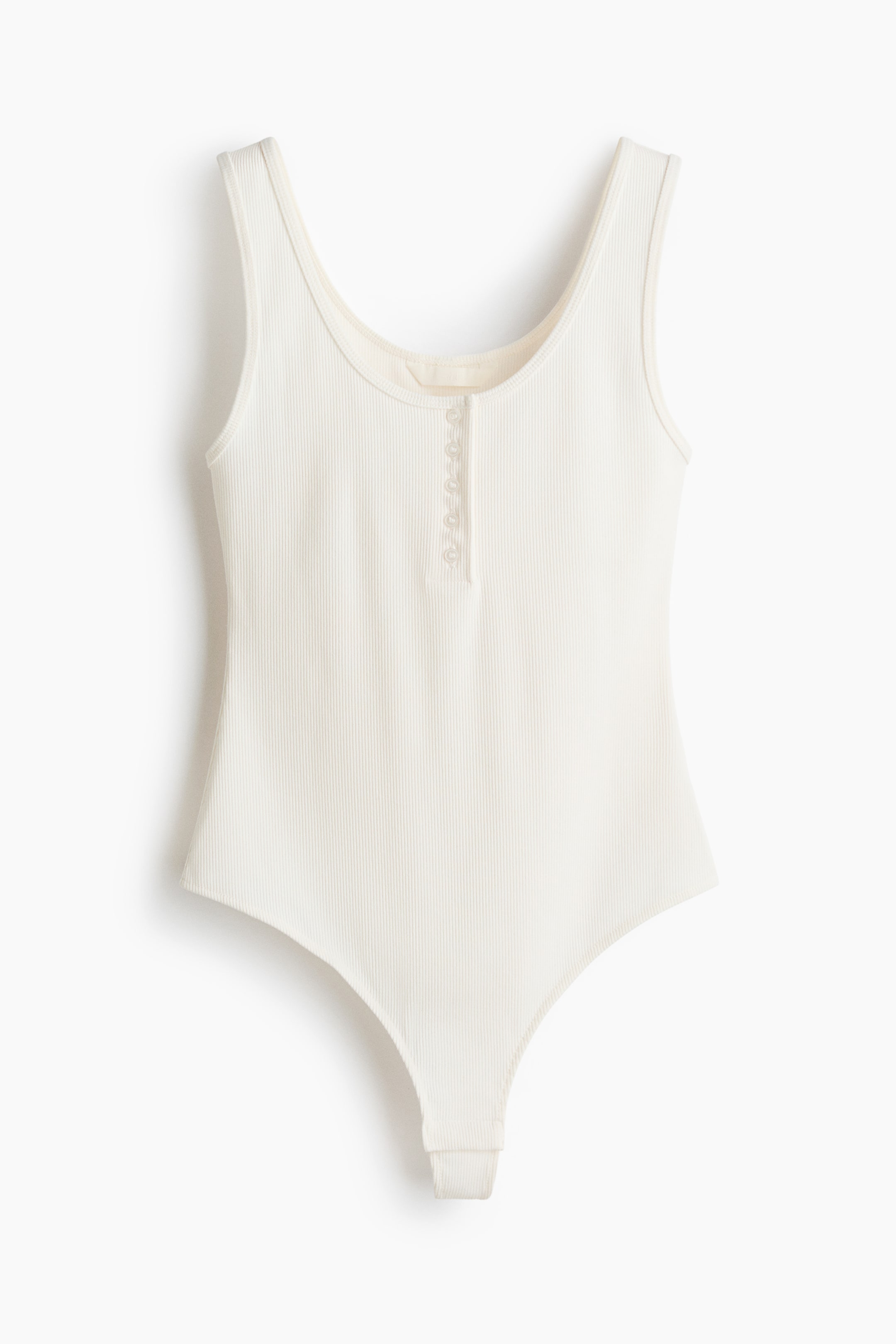 View larger image: An off-white sleeveless body in ribbed jersey is being showcased from the FRONT, featuring a scoop neckline, a front button placket with six small buttons, narrow binding around the neckline and armholes, and concealed press-studs at the crotch.