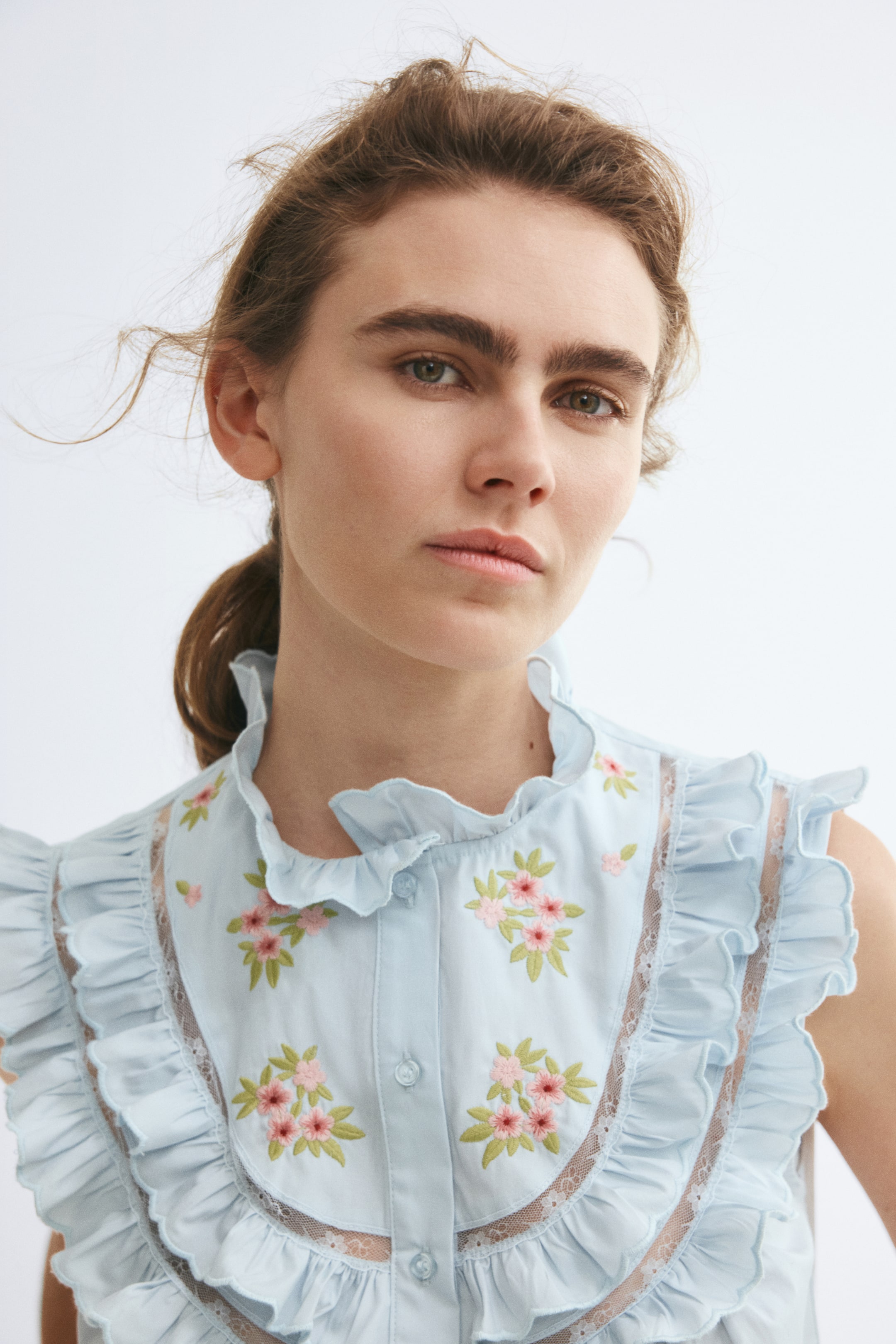 View larger image: Embroidered ruffled blouse - Light blue/Flowers - Ladies | H&M 1