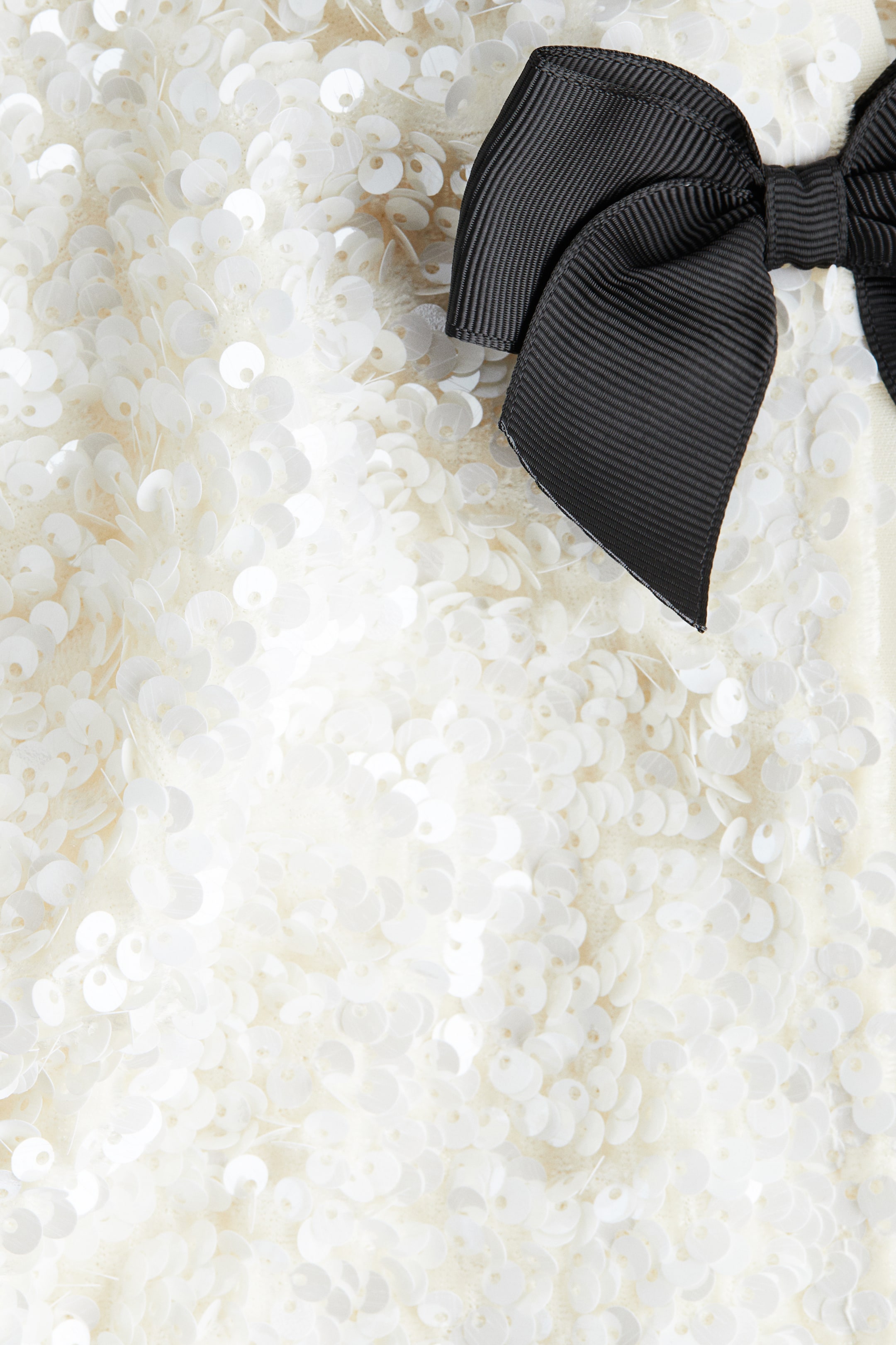 Ampliar la imagen: Saco de lentejuelas con moños - Blanco - Kids | H&M MX 2