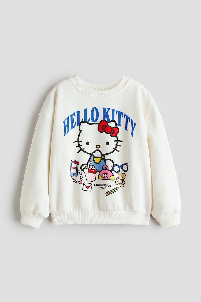 Sudadera estampada con interior cepillado - Blanco/Hello Kitty/Gris jaspeado/Minnie Mouse/Rosa/CapyFun/Rojo claro/Hello Kitty/Gris claro/Las guerreras K-pop/Violeta empolvado/Hello Kitty/Azul claro/Lilo y Stitch/Violeta/Casa muñecas de Gabby/Azul oscuro/Harvard University - 1