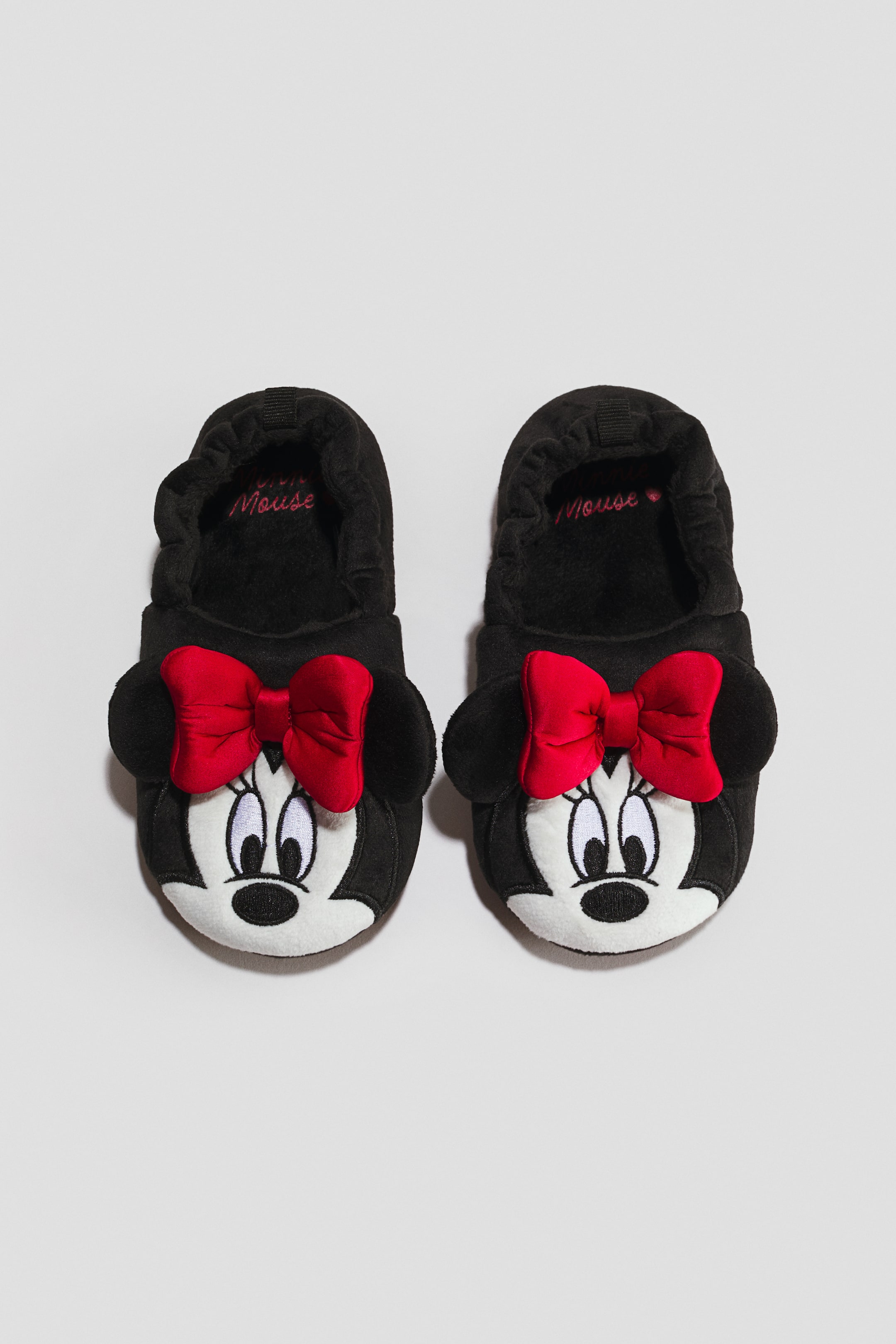 View larger image: Soft slippers - Black/Minnie Mouse - Kids | H&M 1