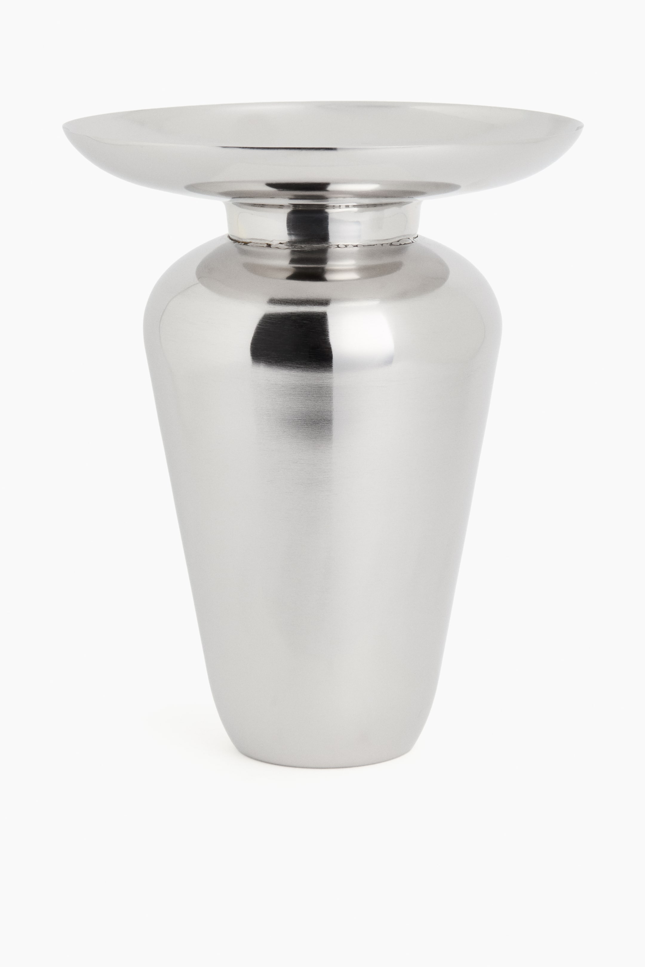 View larger image: "A polished silver metallic object features a wide, shallow, concave top surface that connects to a narrow, cylindrical neck. The body then broadens into a rounded shape below the neck, tapering smoothly towards the base."