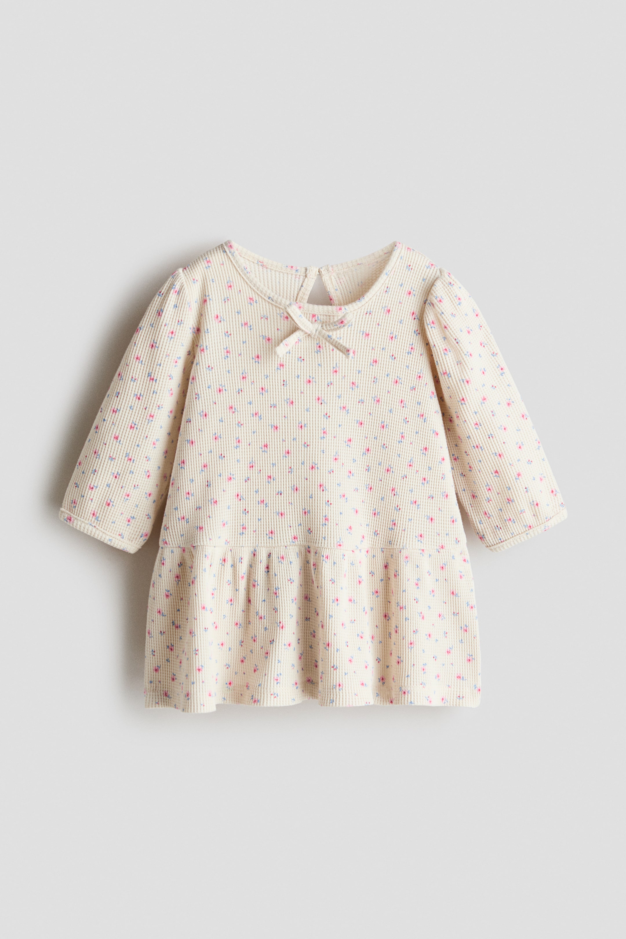 Visualizza immagine più grande: Abito in cotone con stampa - Beige chiaro/fiori - BAMBINO | H&M IT 1