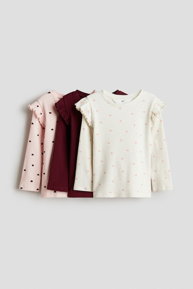 Top in jersey con bordini di volant 3 pz - Rosa chiaro/rosso scuro/cuori/Prugna/fiori/Viola chiaro/arcobaleni - 1
