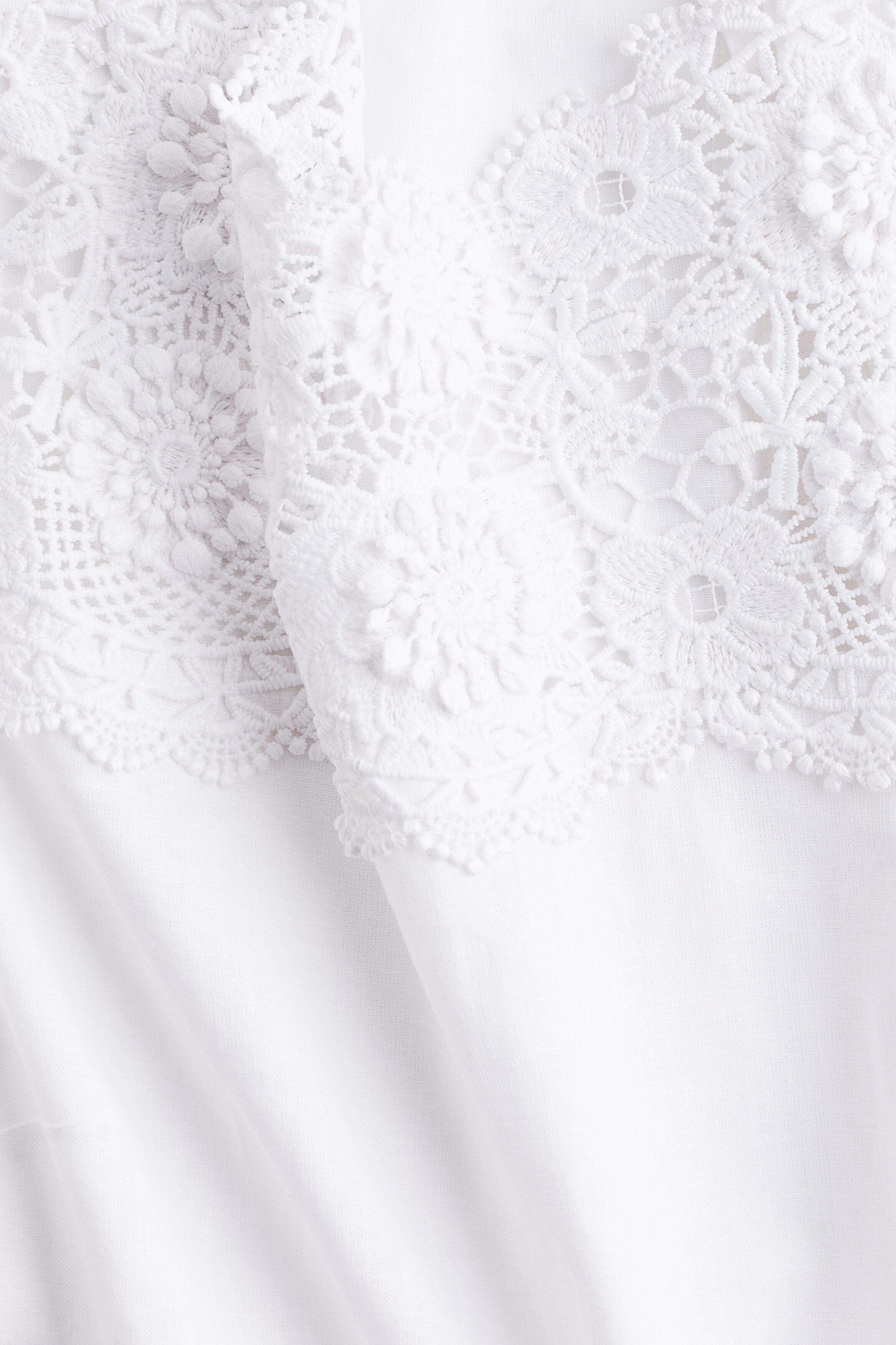 Embroidered linen-blend blouse