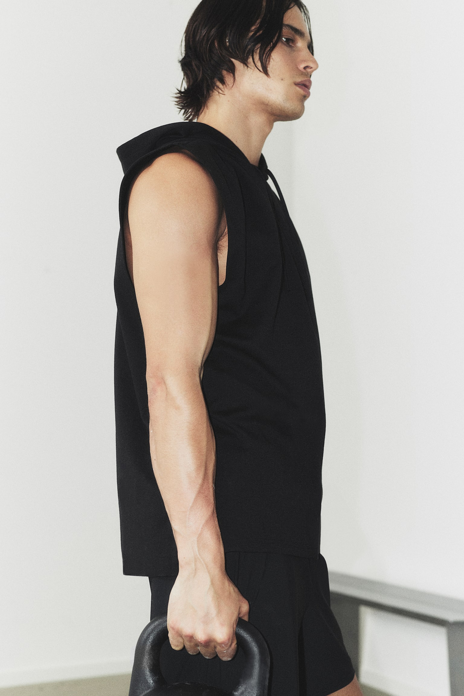 Regular Fit Sleeveless sports hoodie in DryMove™ - Black - 1