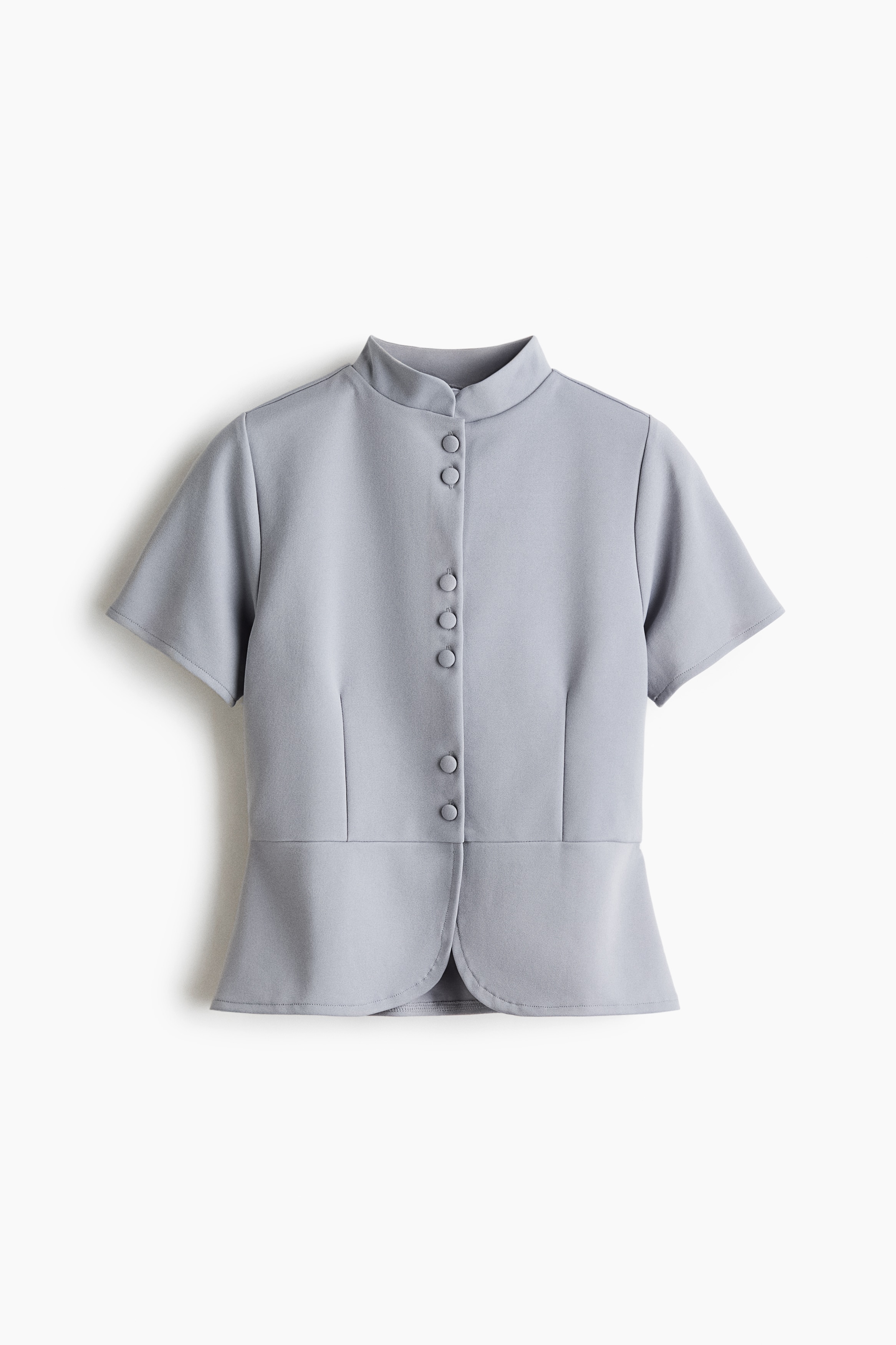 Button-front peplum topModel