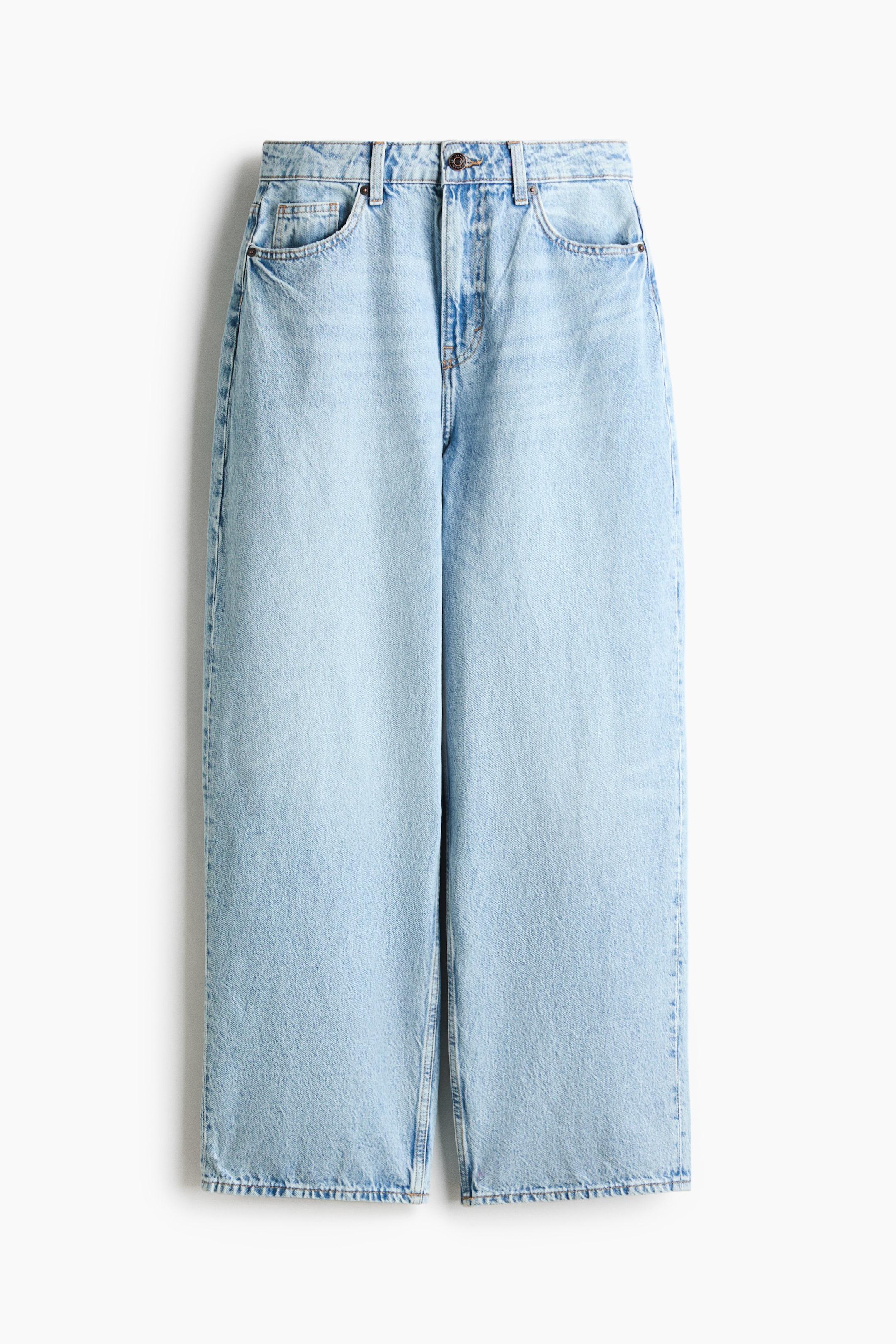 View larger image: A pair of high-waisted, light blue denim jeans is shown from the front, featuring a classic five-pocket design with a zip fly and button closure. The jeans are hanging straight, displaying a relaxed, wide-leg silhouette from the hips down to the hems.