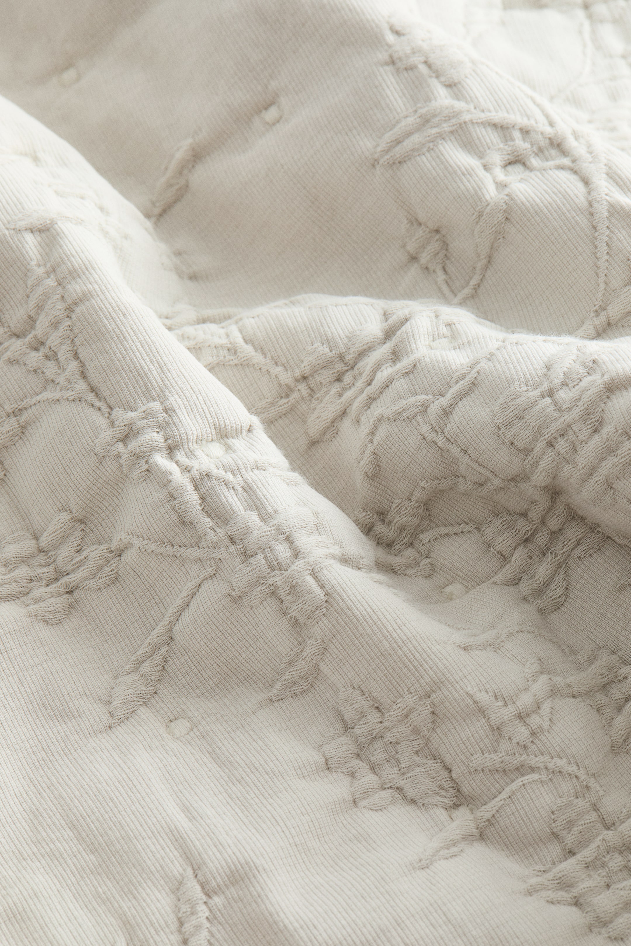 Housse de coussin en tissu jacquard