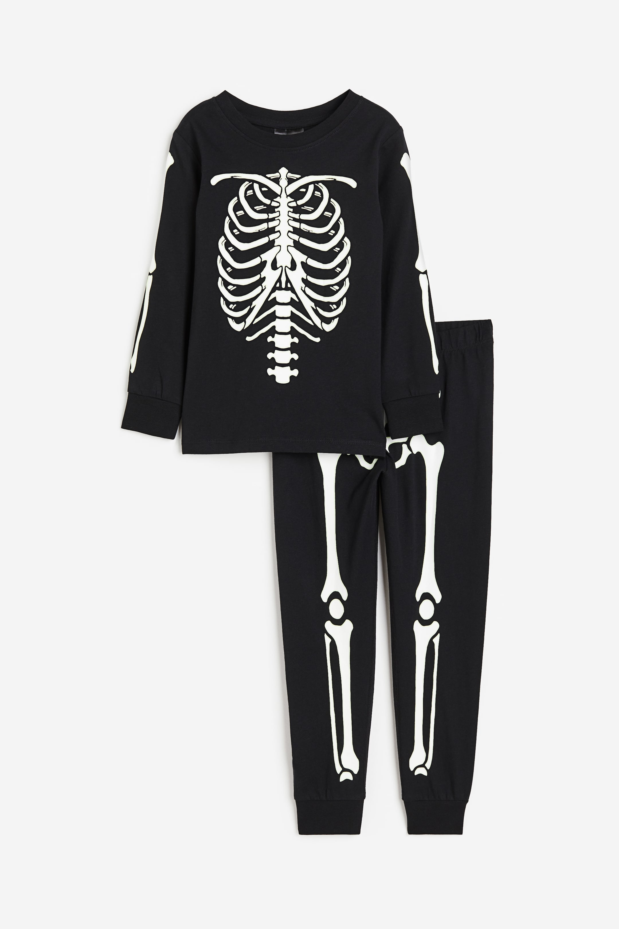 Printed pyjamas - Black/Skeleton - Kids | H&M GB