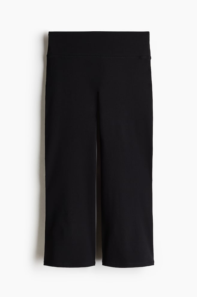 Flared Capri Sports leggings with SoftMove™ - Black/Sky blue - 1