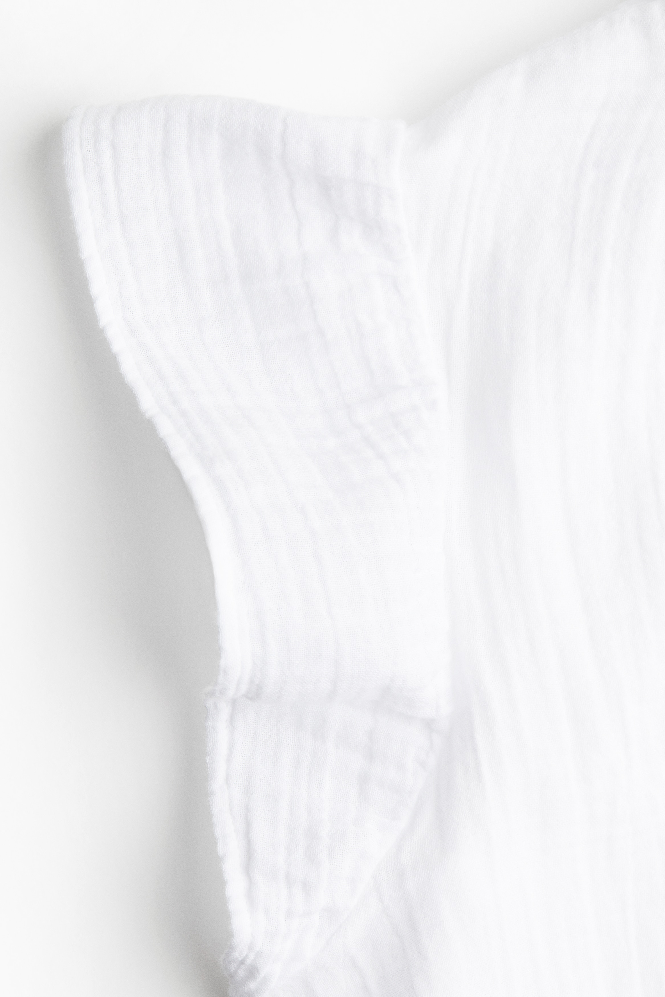 Flutter-sleeved muslin blouse