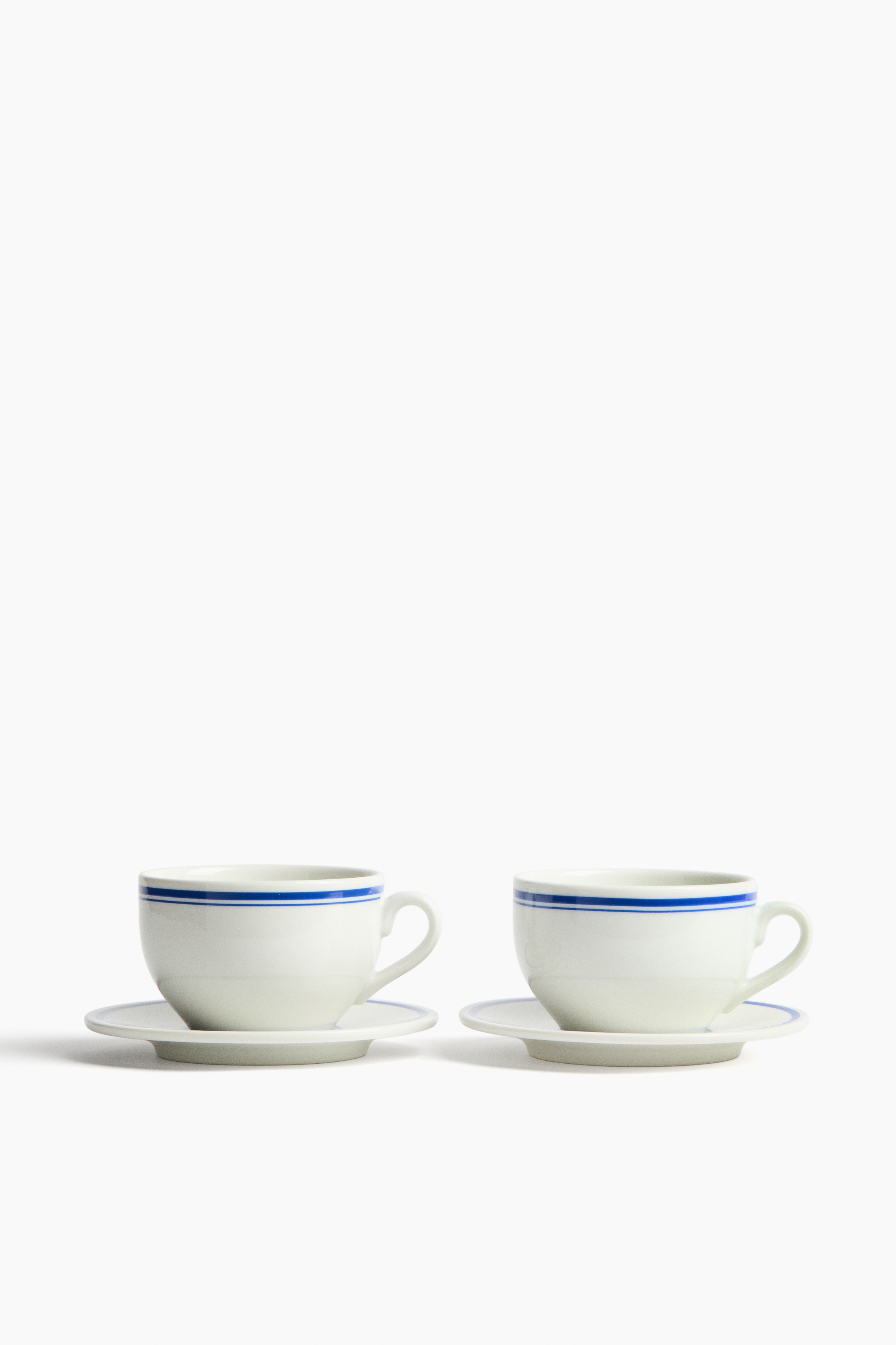 Porcelanowa filiżanka ze spodkiem 2-pak - Biały/Niebieski/Biały/Czarny/Biały/Czerwony