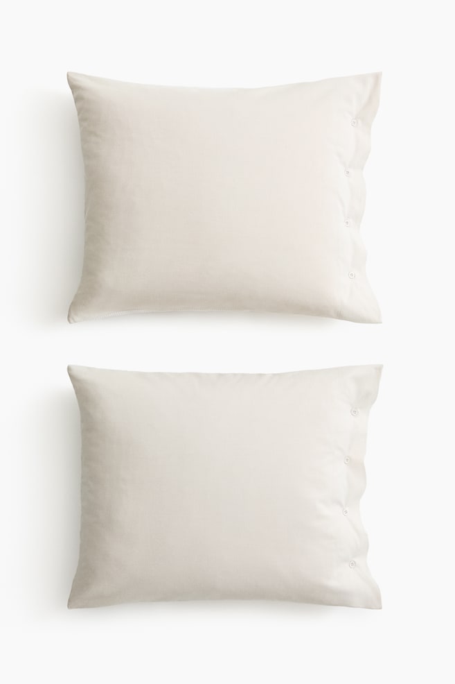 2-pack Fundas de almohada en tejido Oxford - Beige claro/Franjas/Azul tenue pálido/Franjas - 1