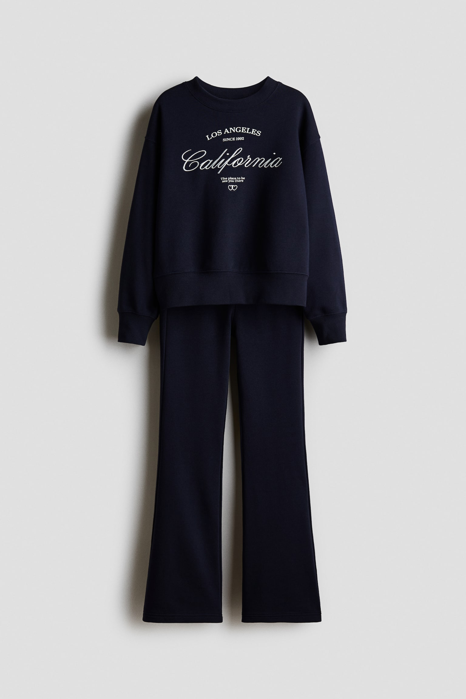 Tweedelige set - Sweater en joggers - Marineblauw/California/Blauw/Paris/Lichtroze/strik