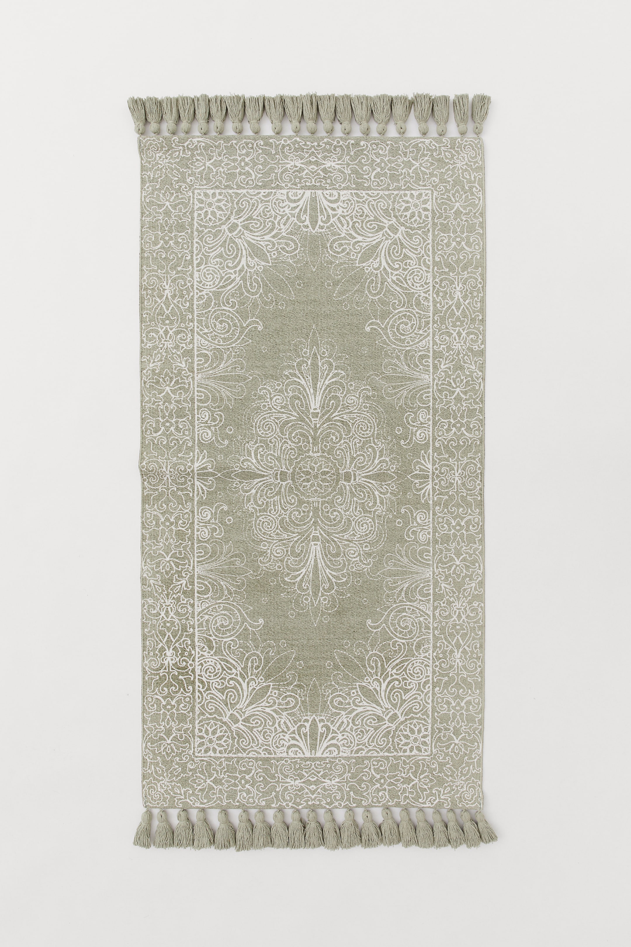 Zobrazit větší obrázek: Bavlněný kobereček se střapci - Khaki zelená/bílý vzor - HOME | H&M CZ 1