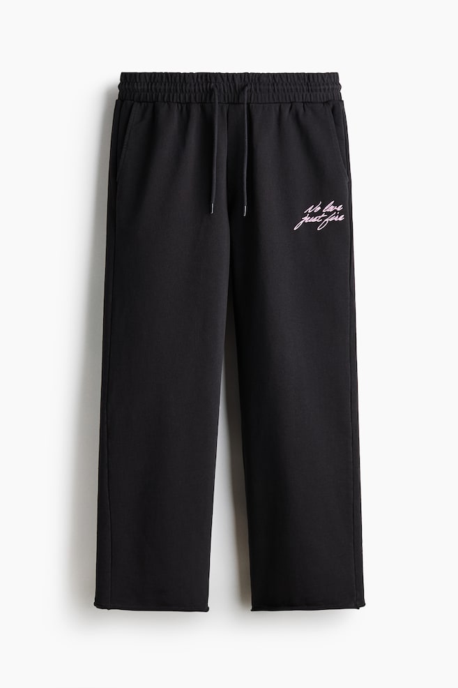 Joggpants aus Baumwolle in Relaxed Fit - Schwarz/No Love Just Fire/Rosa/Just Love - 1