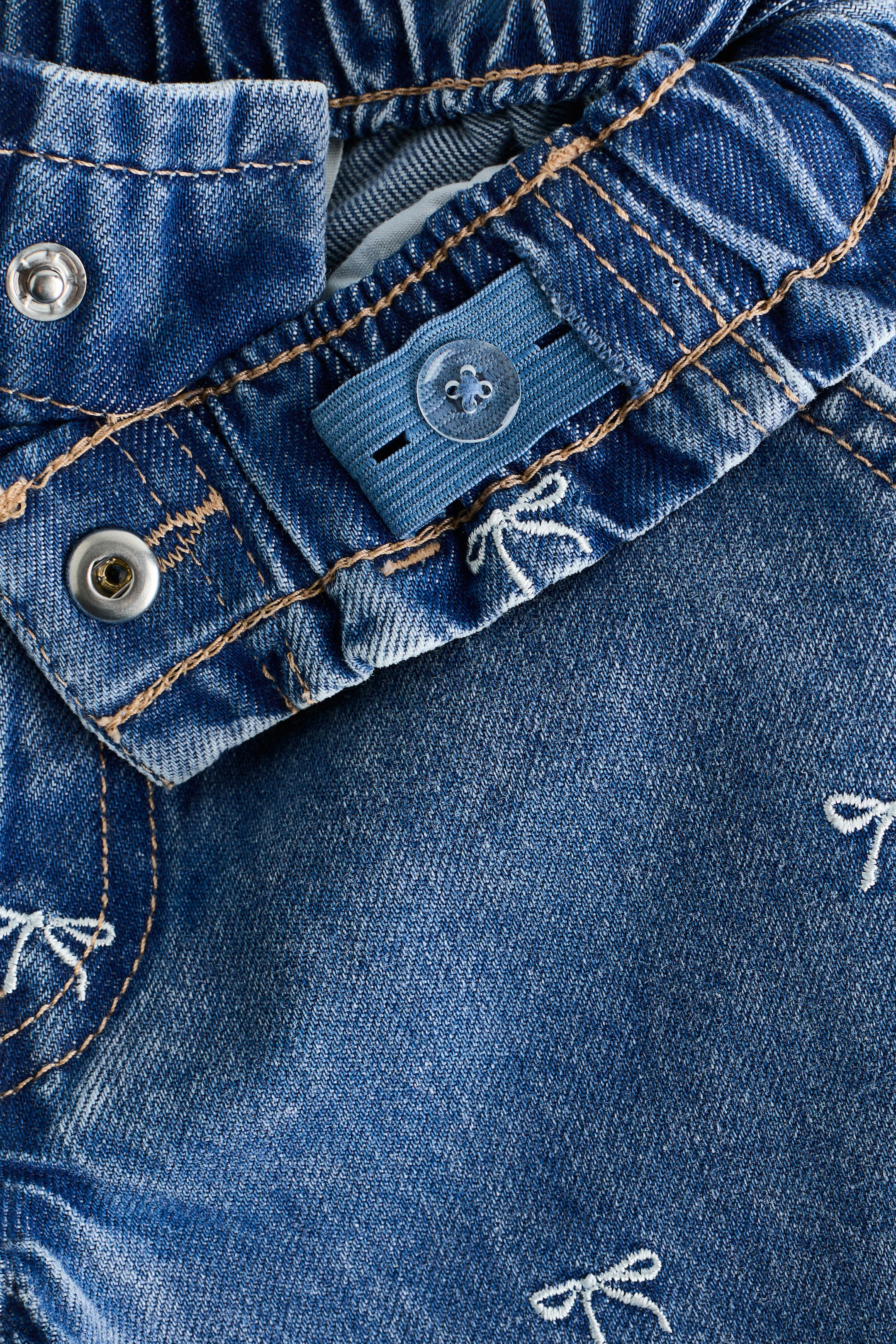 Jean jambes larges sur taille élastique